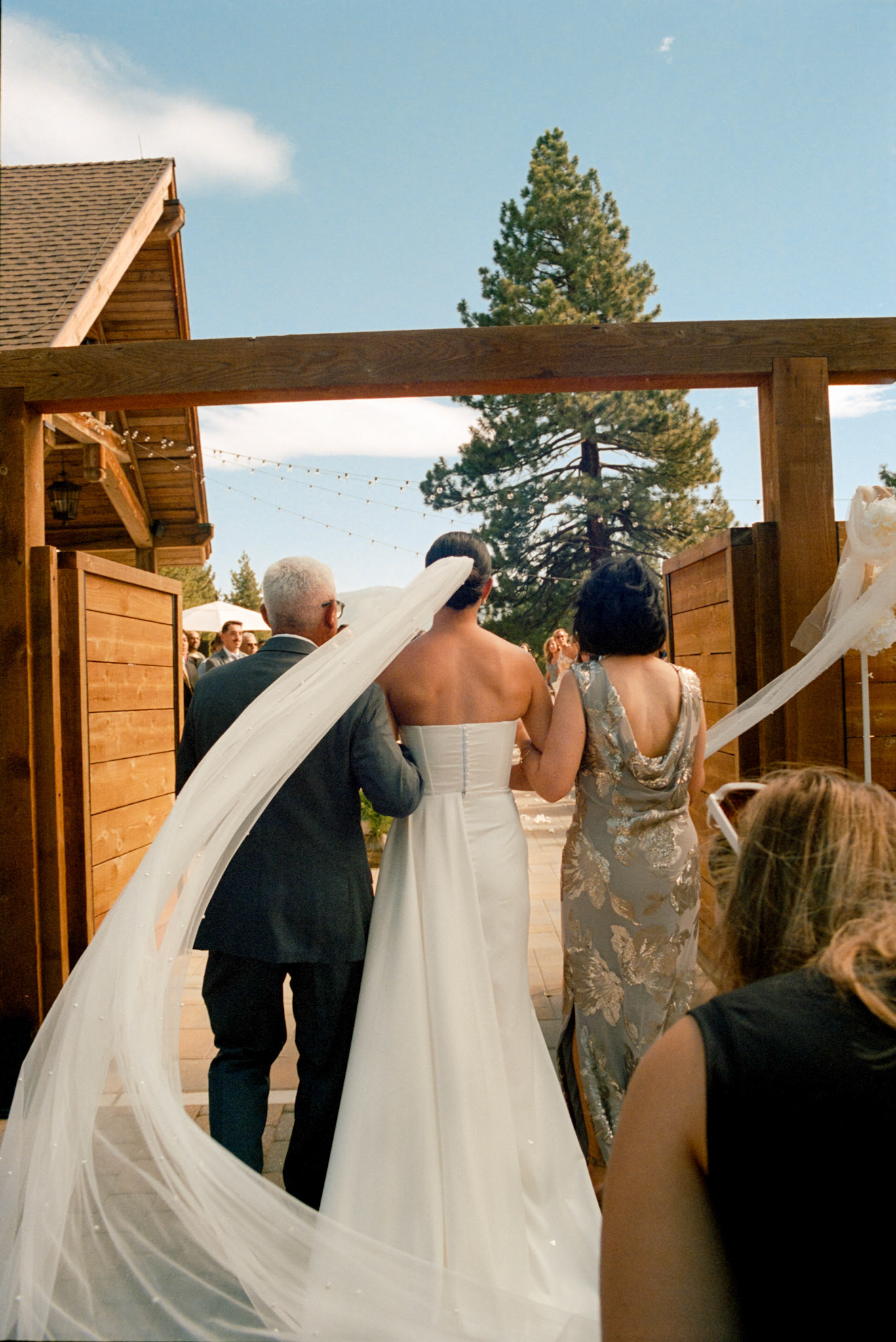 An open-air wedding ceremony beneath the pines at The Timbers at Old Greenwood.