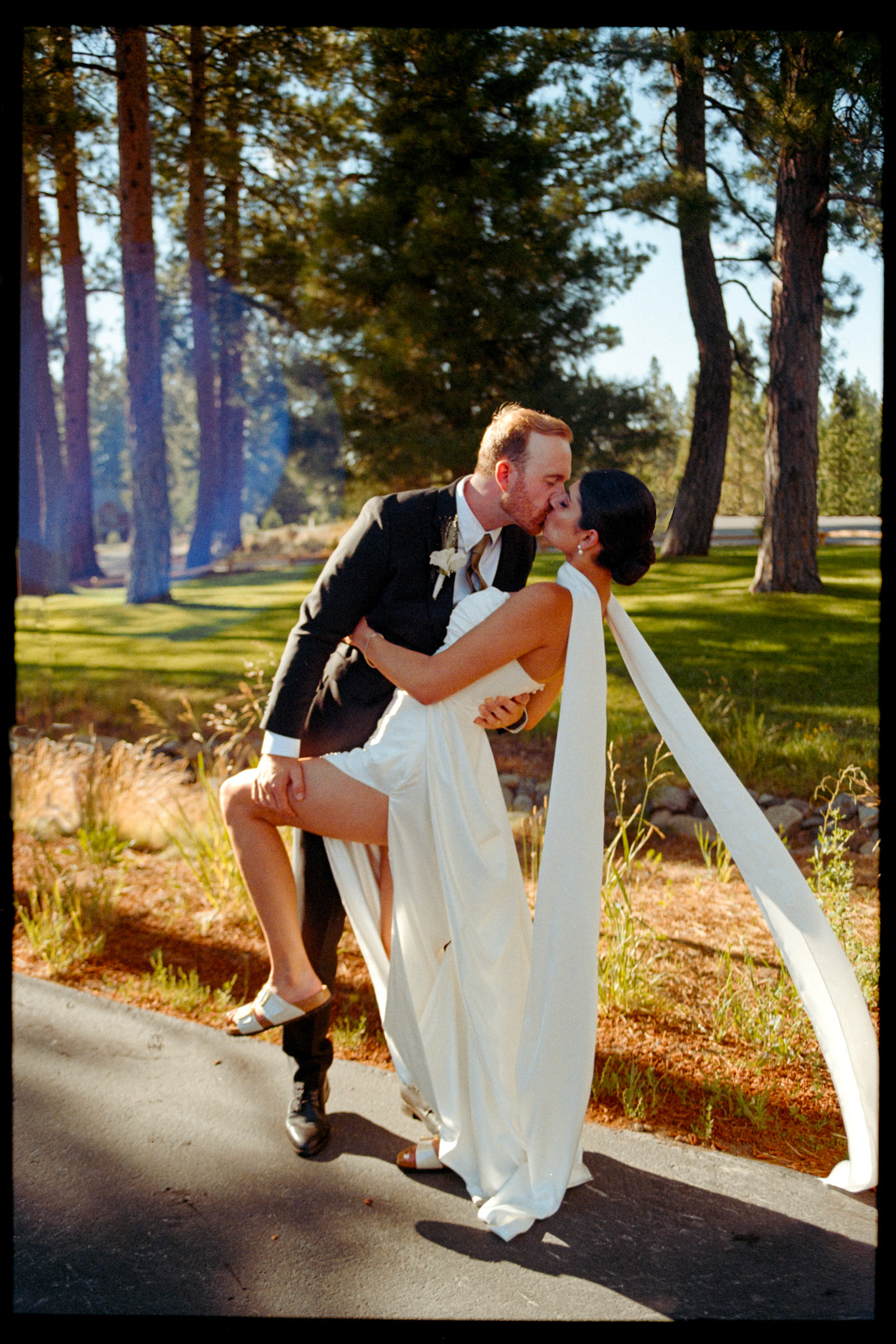 The newlyweds photographed on film among the towering pines and open fairways of Old Greenwood.