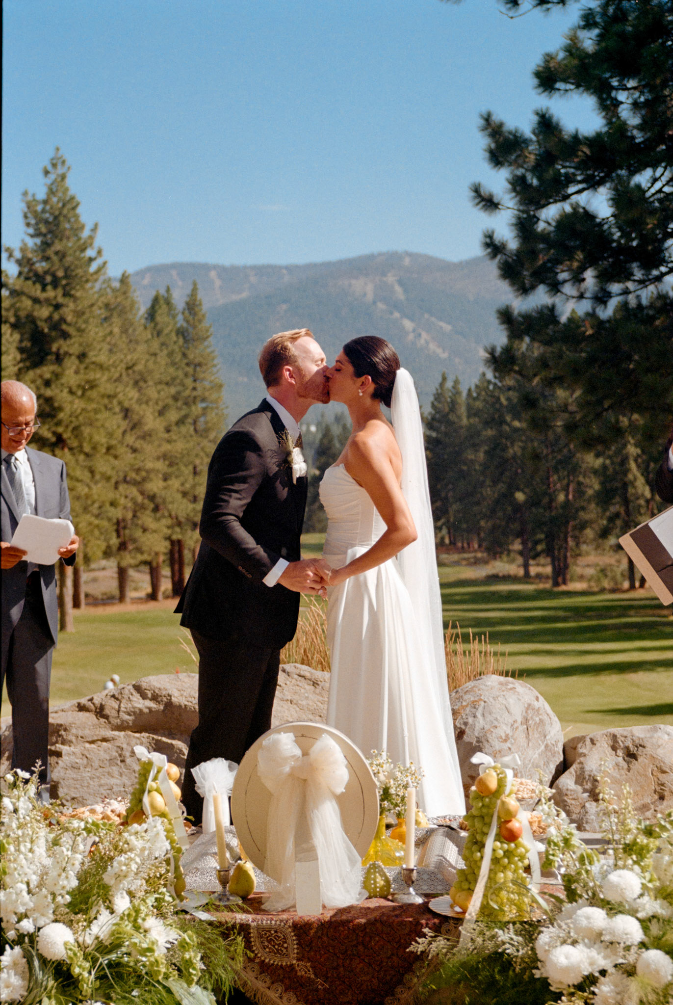 An open-air wedding ceremony beneath the pines at The Timbers at Old Greenwood.