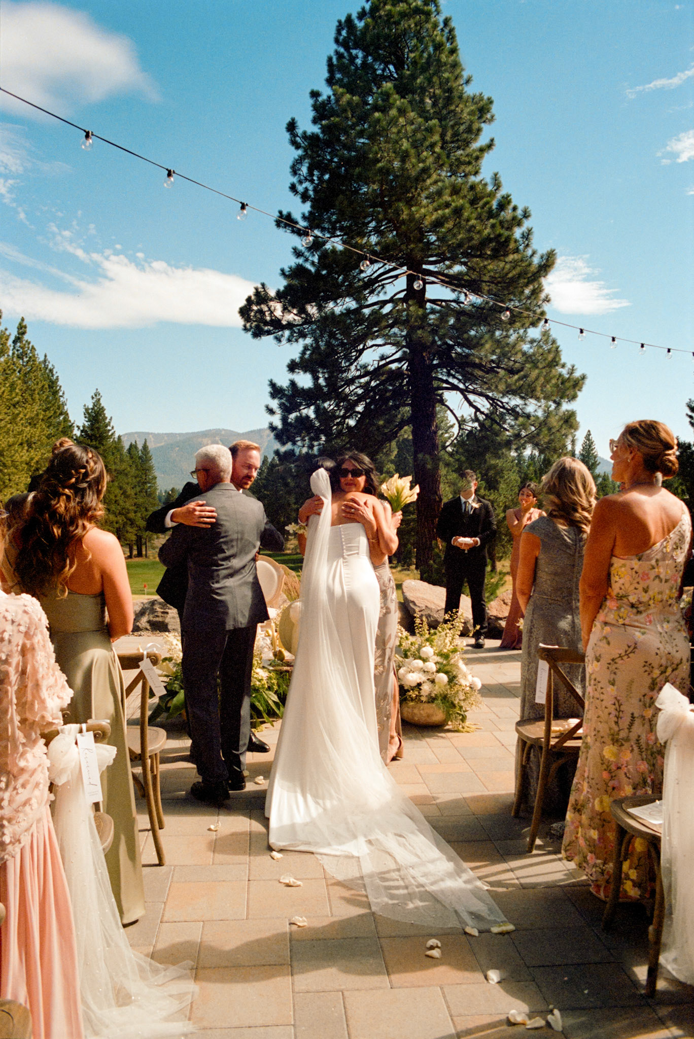 An open-air wedding ceremony beneath the pines at The Timbers at Old Greenwood.