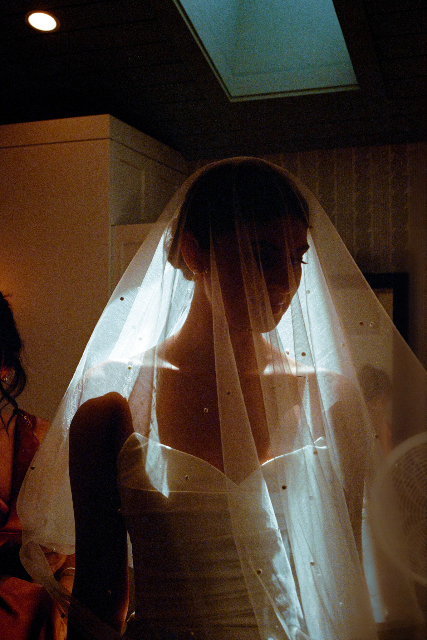 A Julie Vino wedding gown and morning preparations photographed on film in Truckee.
