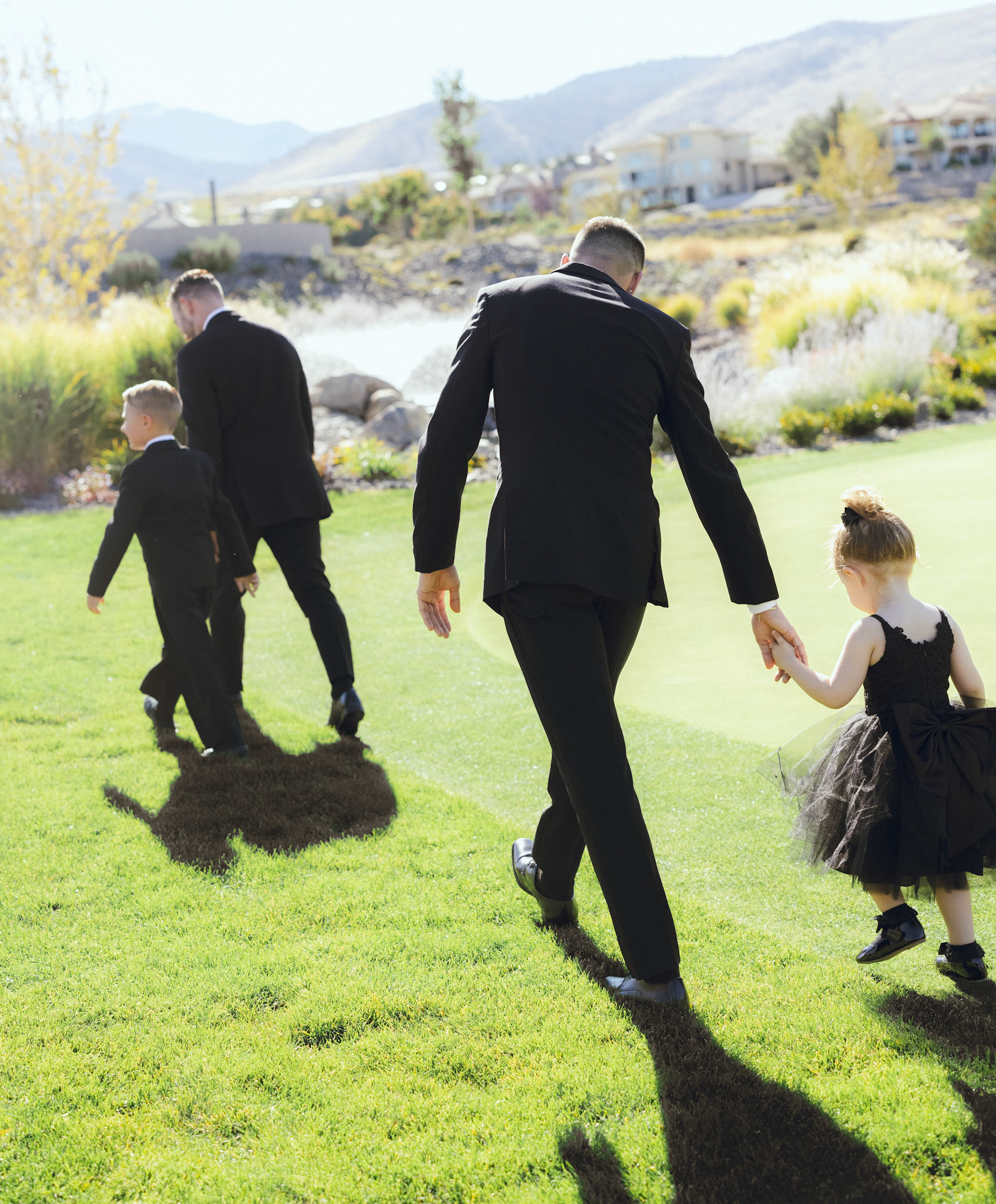 An outdoor wedding ceremony overlooking the Sierra Nevada at The Club at ArrowCreek.