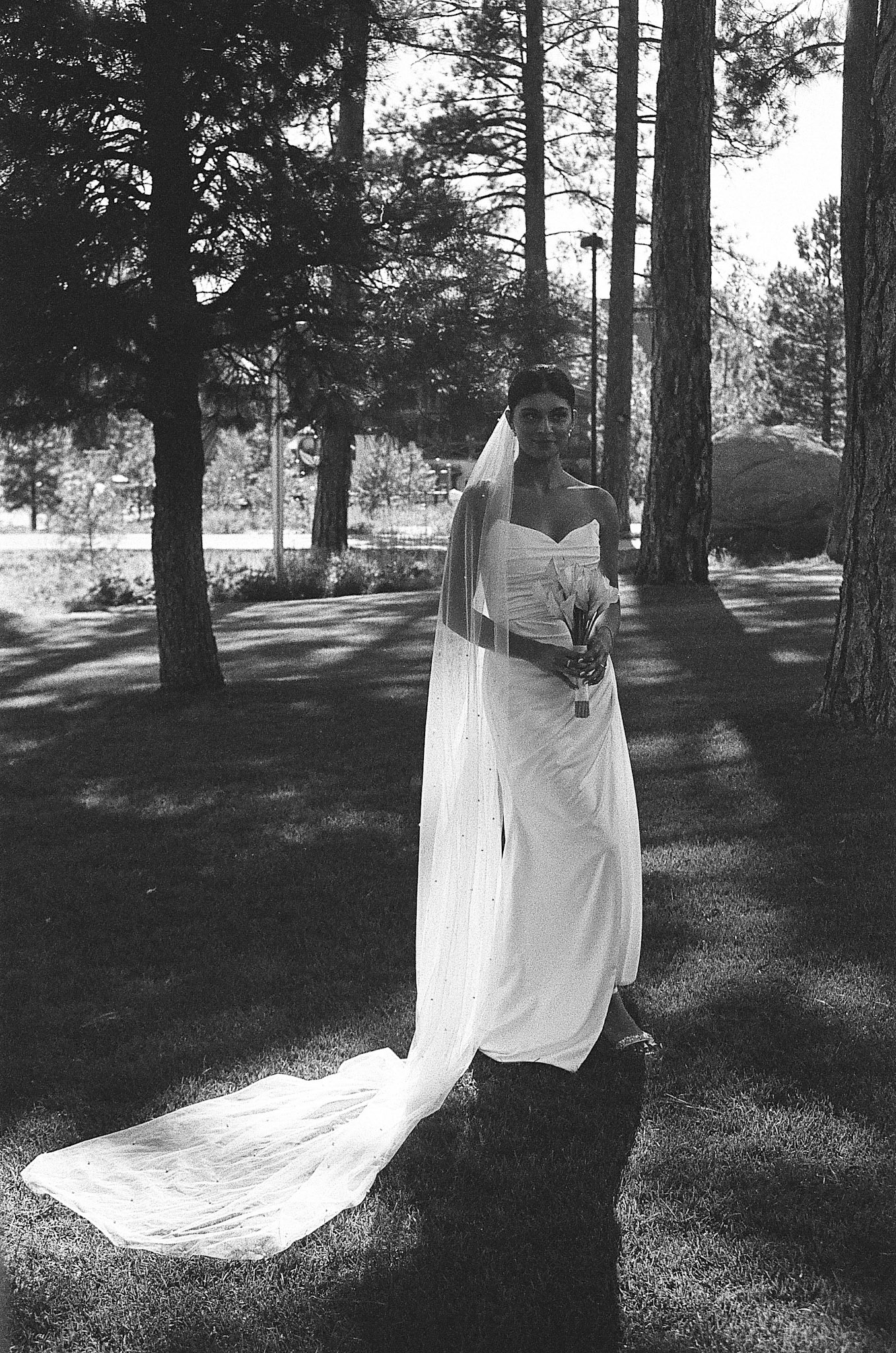 The newlyweds photographed on film among the towering pines and open fairways of Old Greenwood.