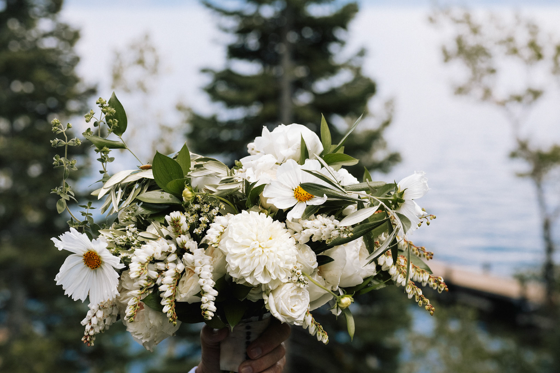 Cami and Tyler’s first look on a private dock overlooking Lake Tahoe.