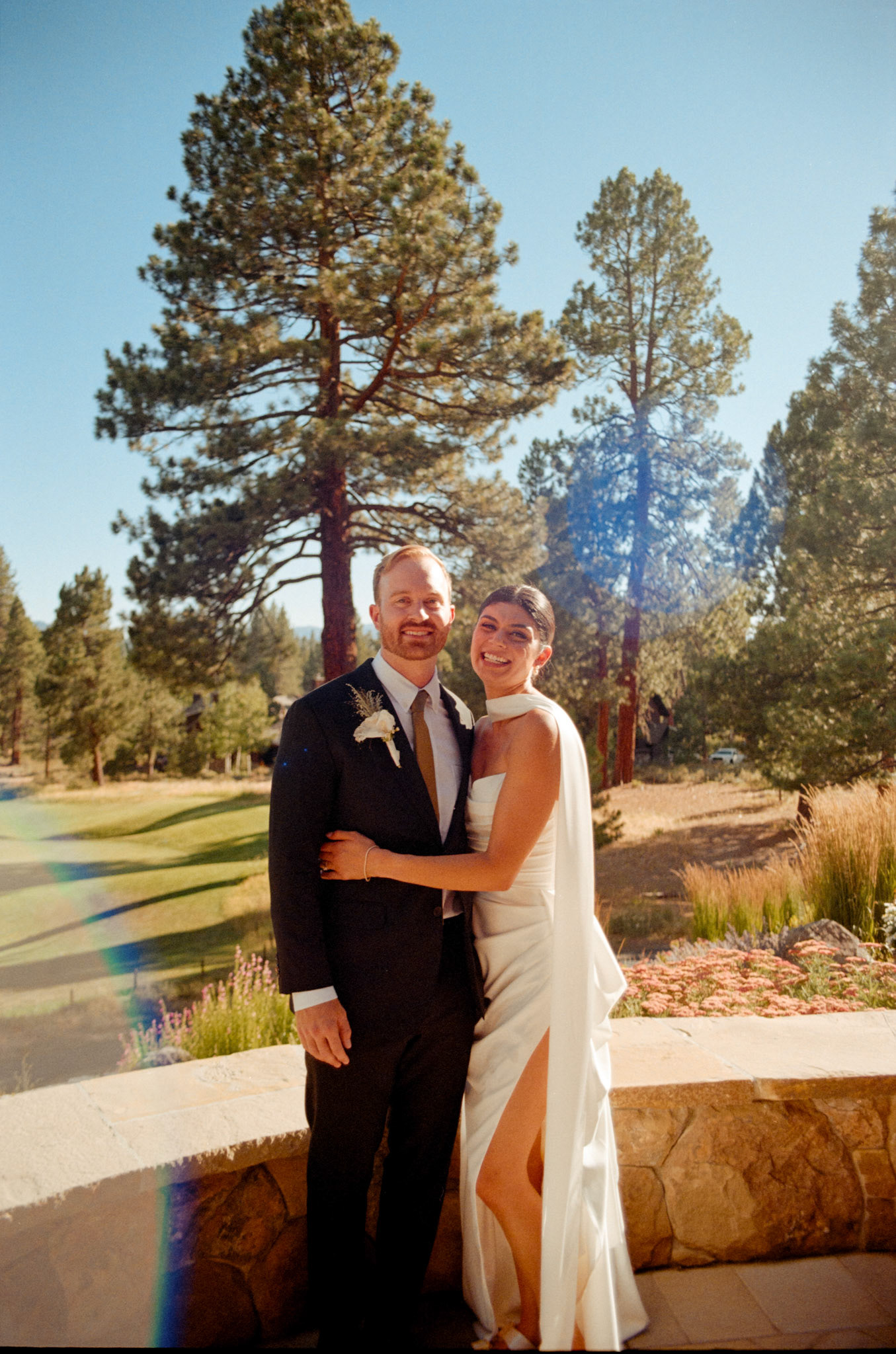 The newlyweds photographed on film among the towering pines and open fairways of Old Greenwood.