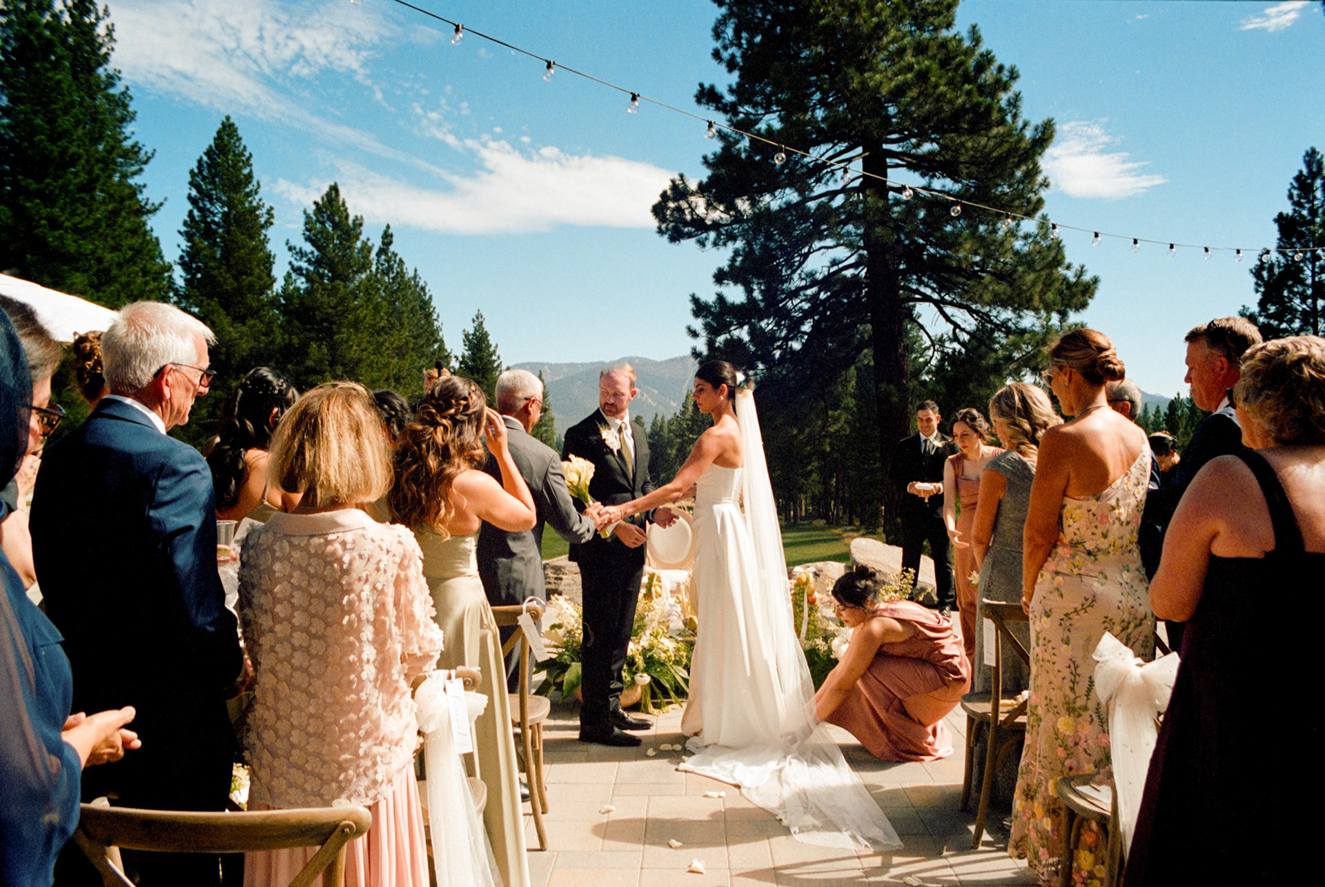 An open-air wedding ceremony beneath the pines at The Timbers at Old Greenwood.