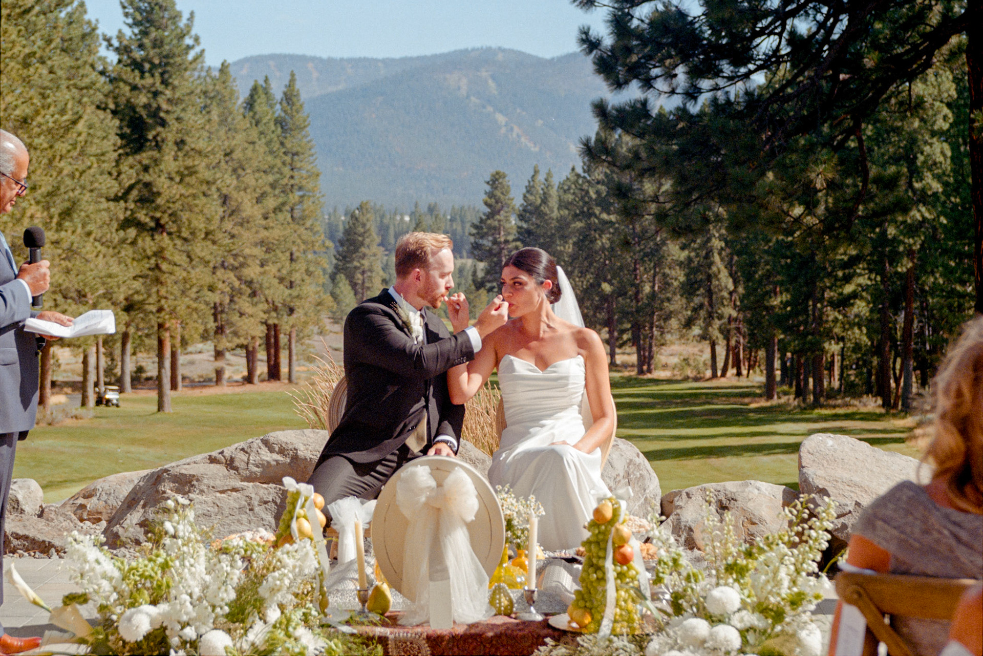 An open-air wedding ceremony beneath the pines at The Timbers at Old Greenwood.