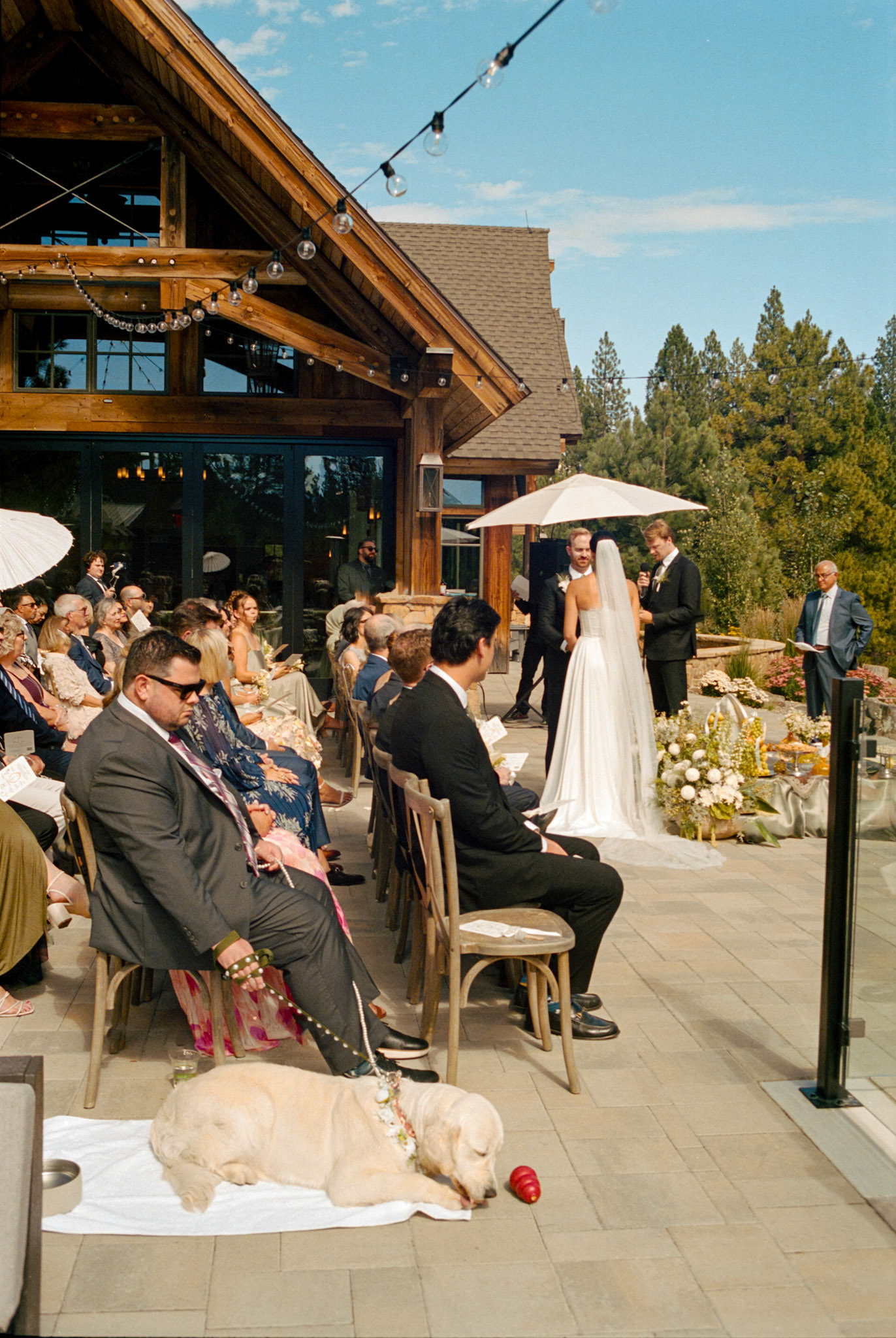 An open-air wedding ceremony beneath the pines at The Timbers at Old Greenwood.