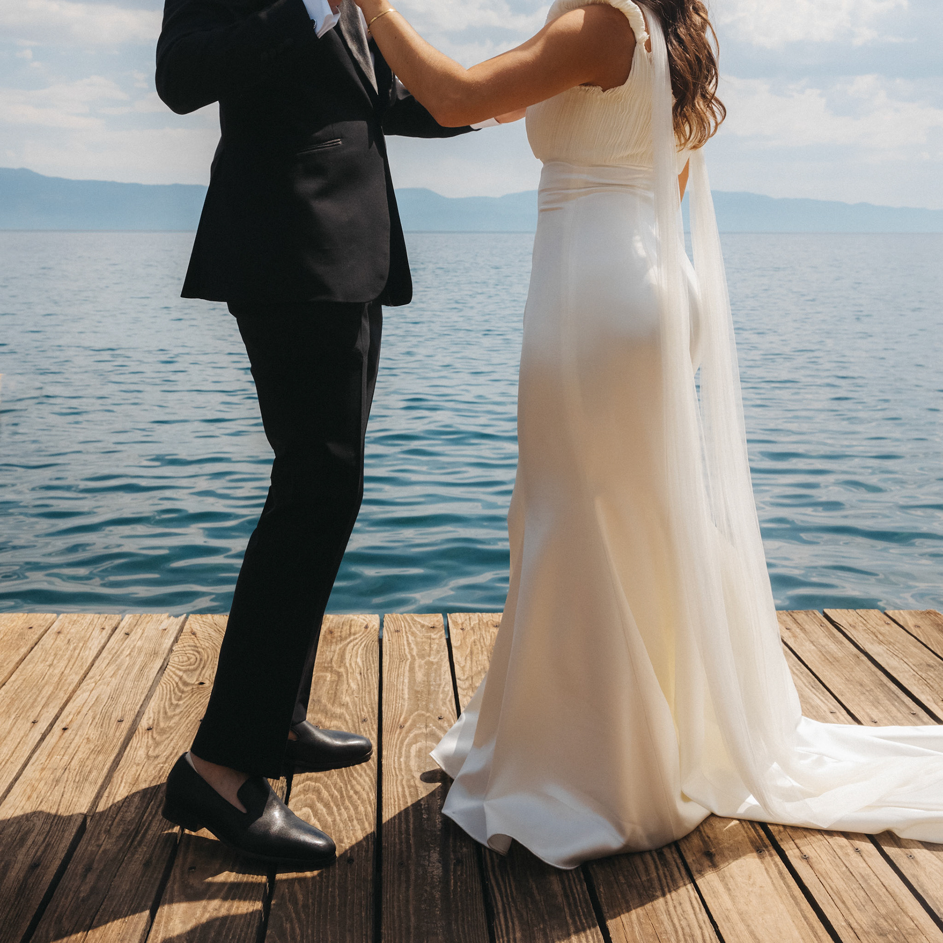 Cami and Tyler’s first look on a private dock overlooking Lake Tahoe.