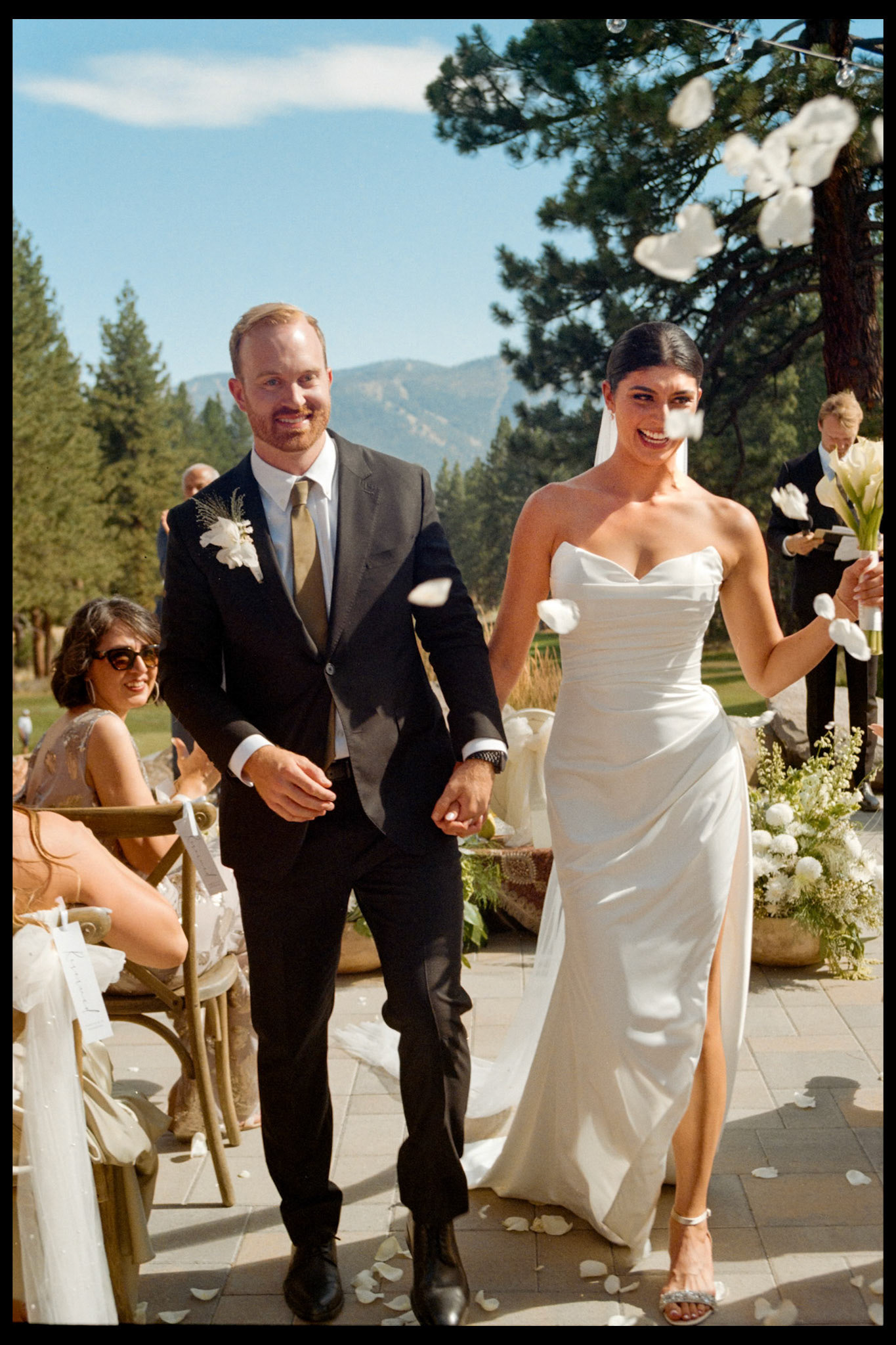 An open-air wedding ceremony beneath the pines at The Timbers at Old Greenwood.