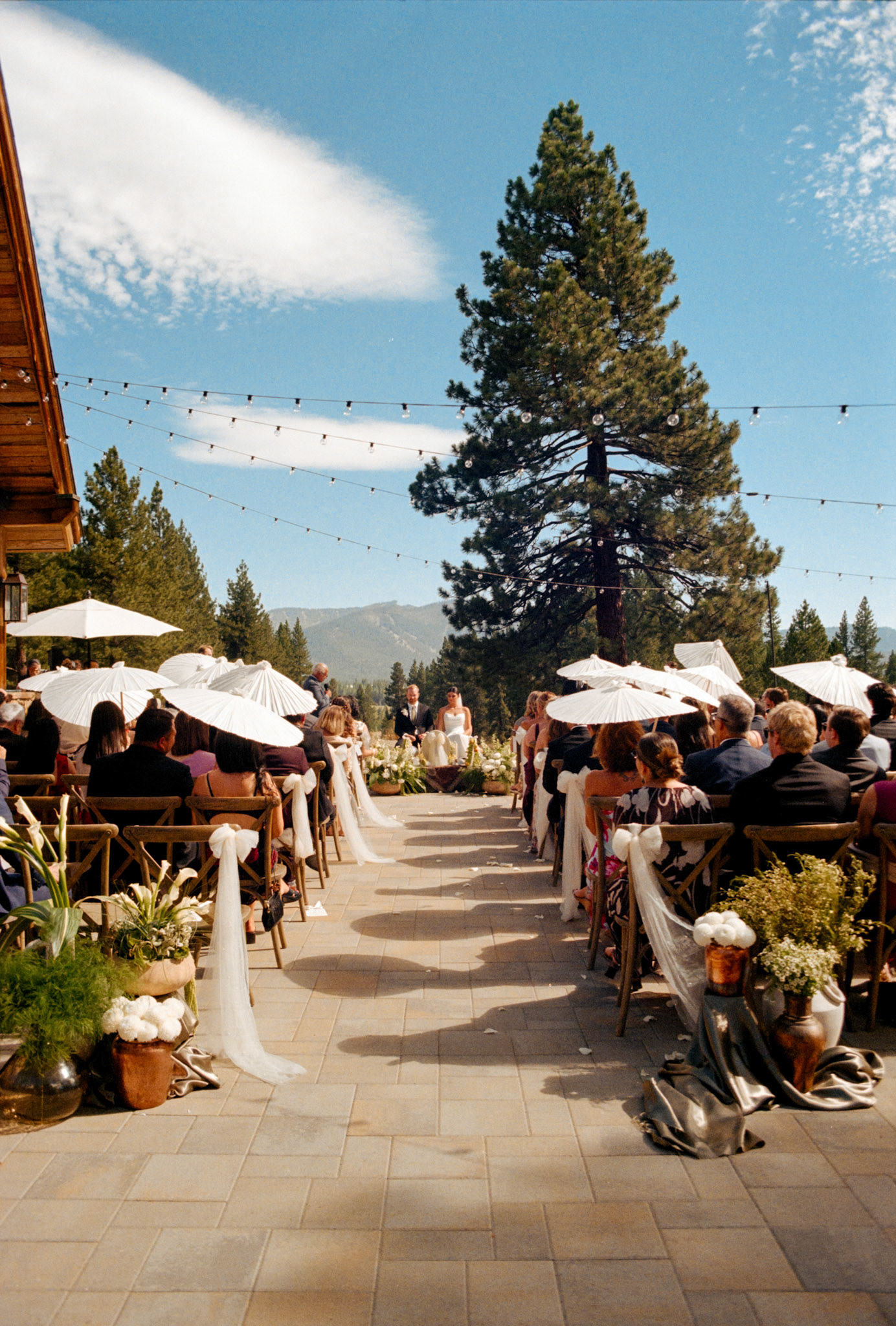 An open-air wedding ceremony beneath the pines at The Timbers at Old Greenwood.