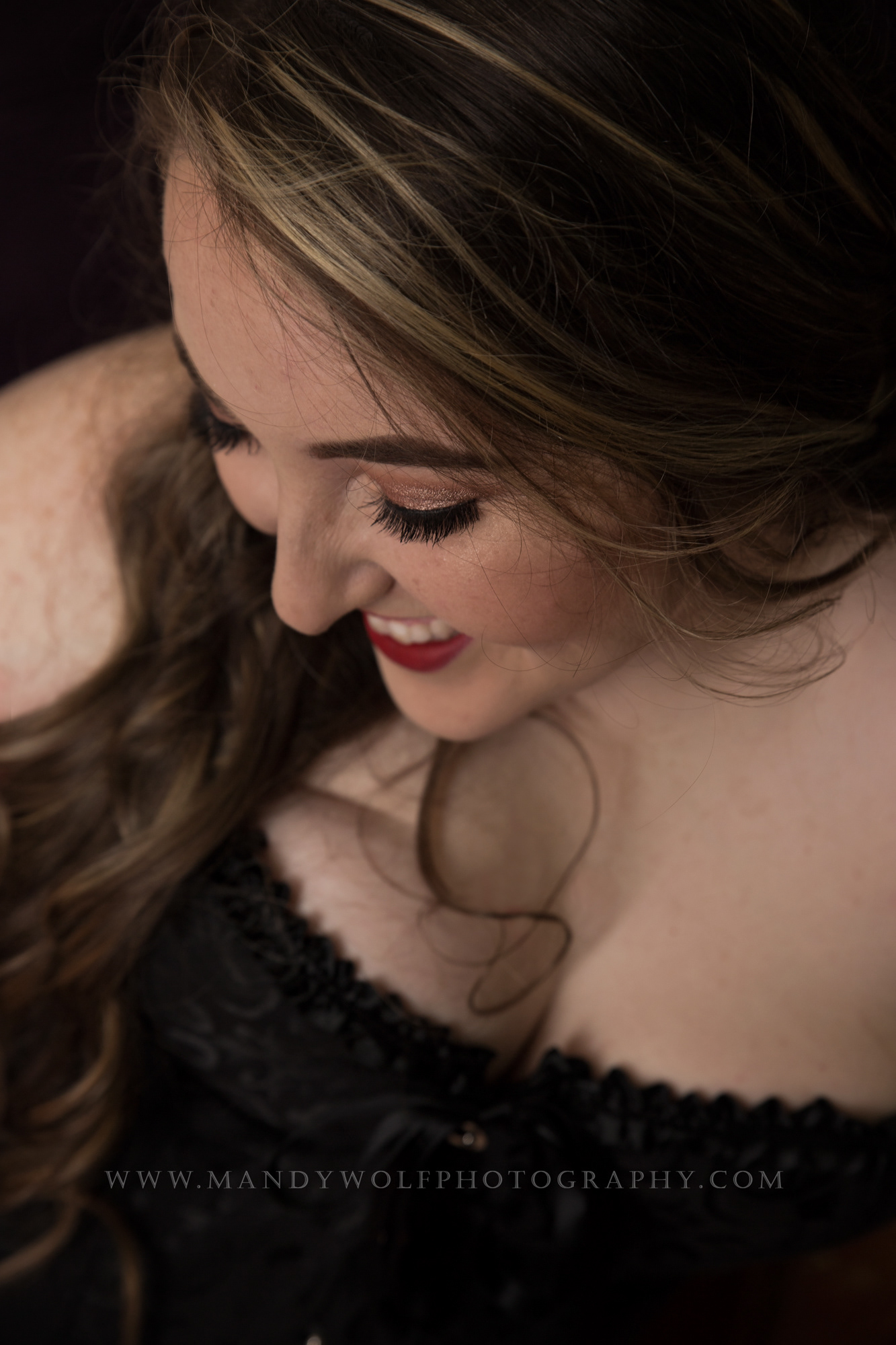 Red lips, Black Corset, Perfect Smile, and False lashes. Victorian styled portrait. Mandy's Boudoir Beauties | Chattanooga TN
