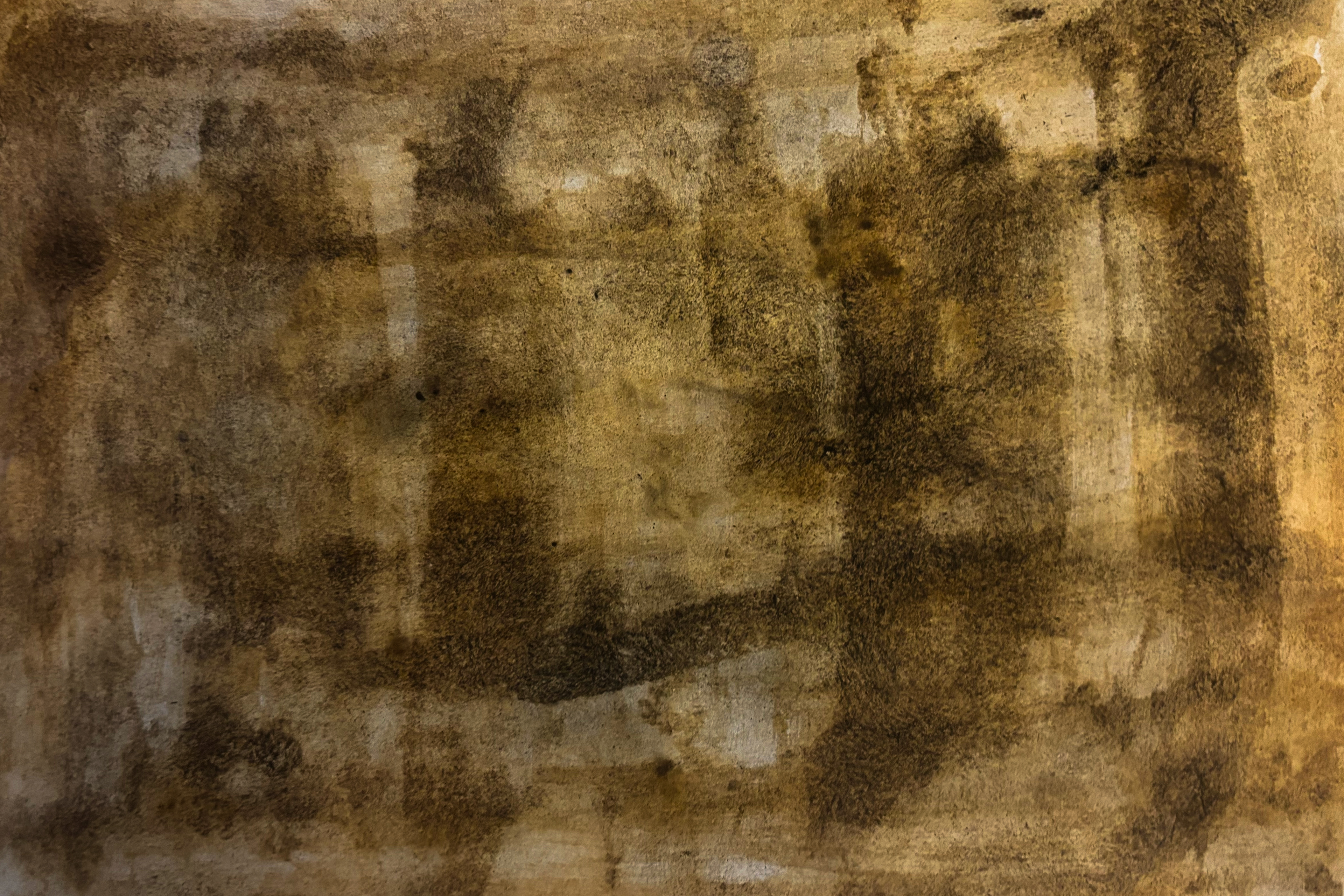 Paper treated with coffee, charcoal, and open flame