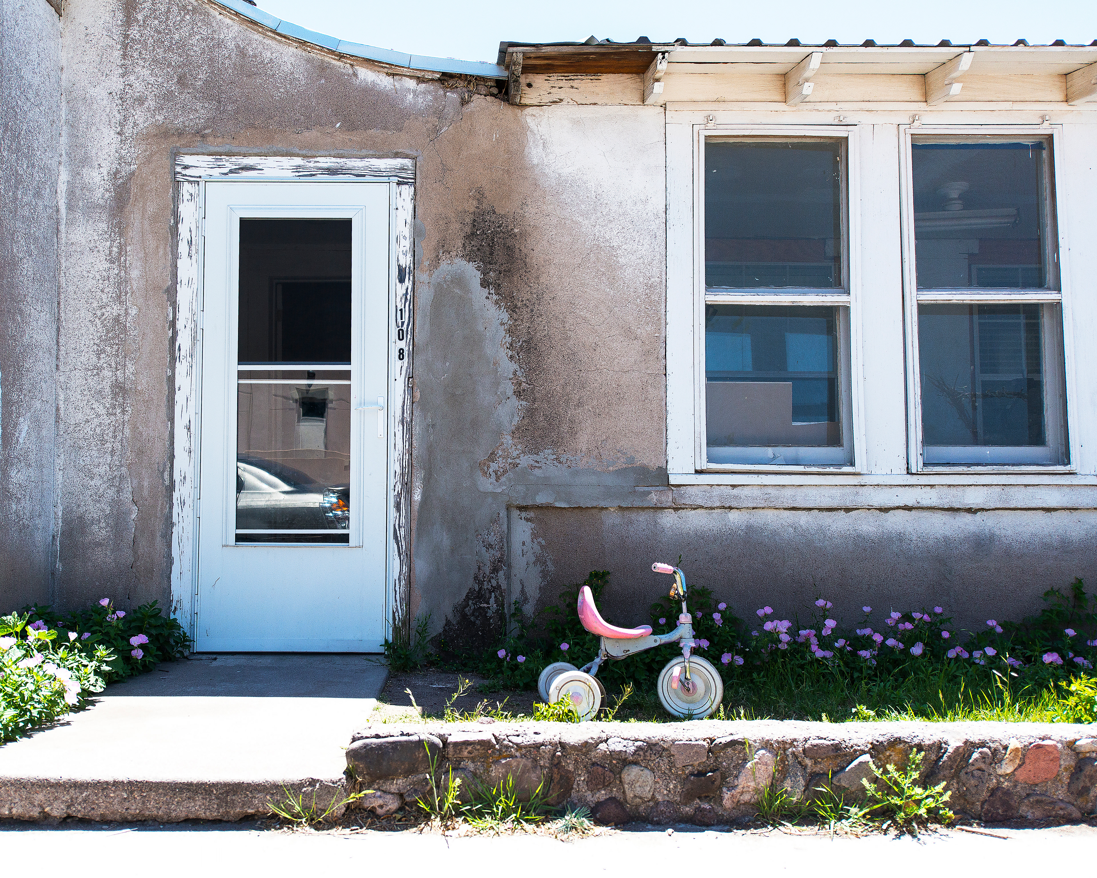 House with Pink Tricycle