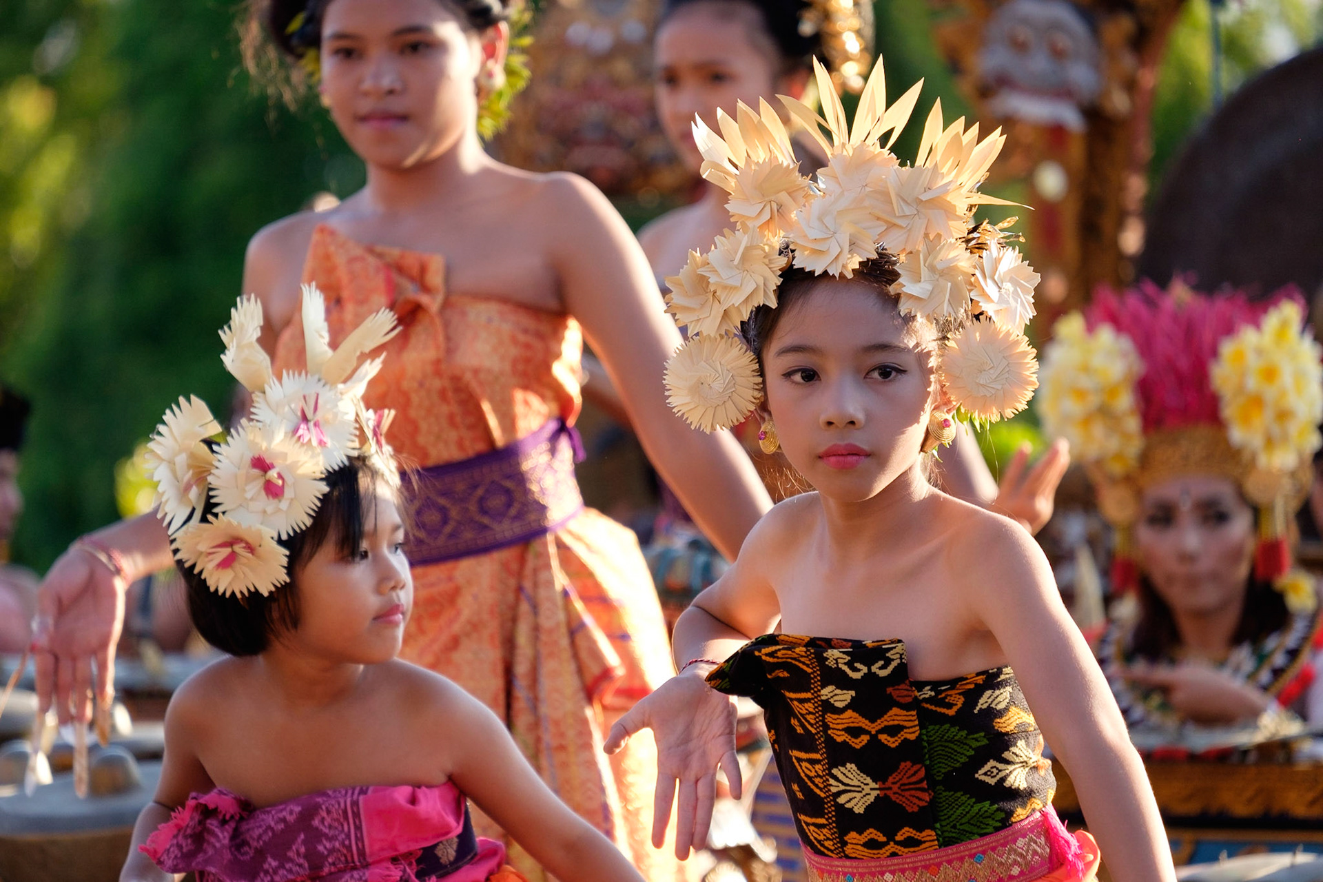 Young Balinese dancers doing thier routine during the knowledge day celebrations at Puri Lumbung Cottages, Munduk, Bali, Indonesia.