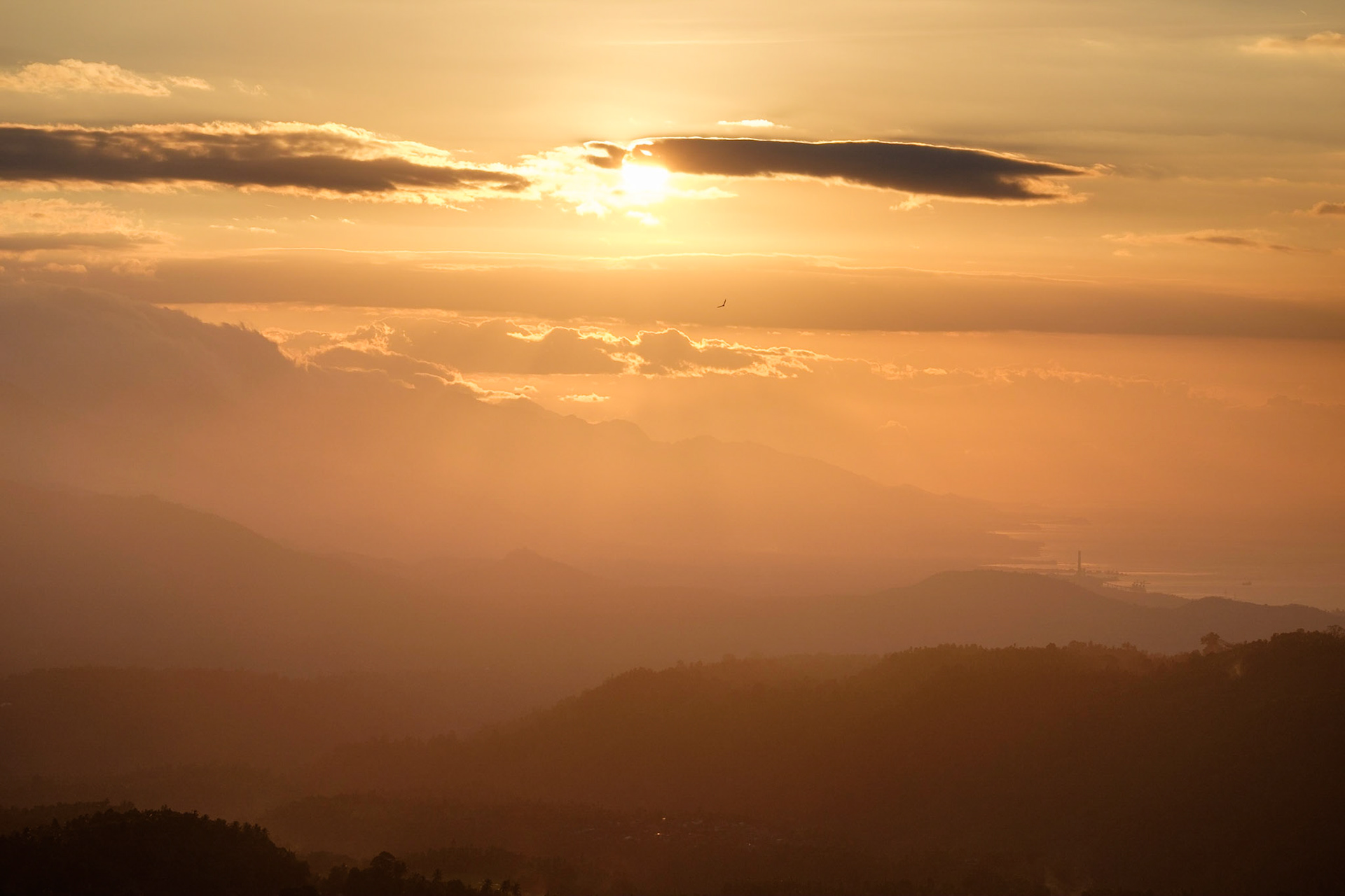 Sunset from the terrace at Puri Lumbung cottages, Munduk, Bali, Indonesia.