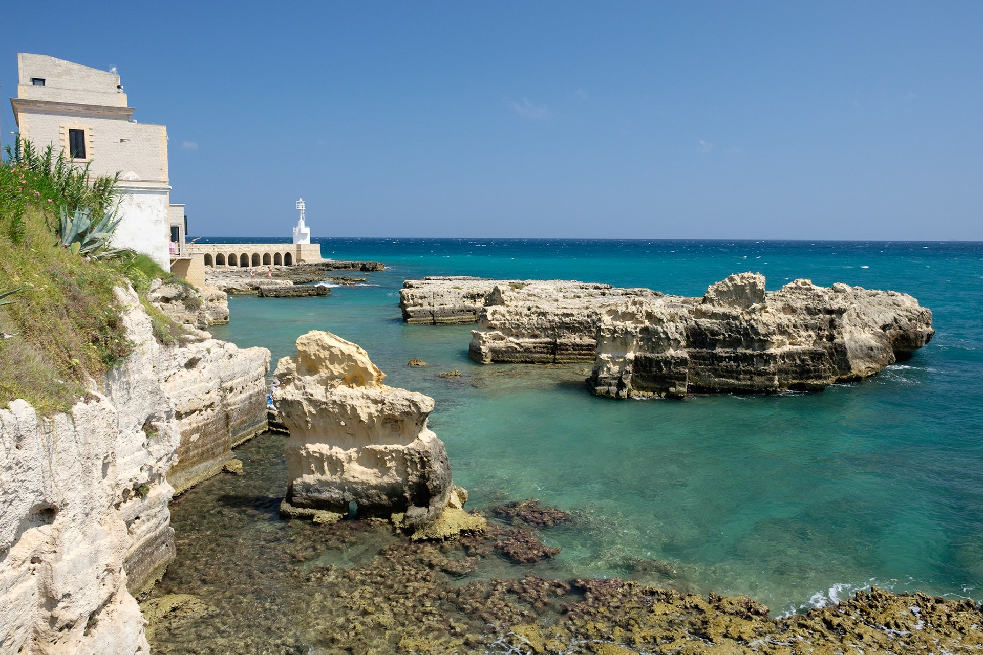 The Faro di Punta Cràulo lighthouse and surrounding shoreline, Otranto.