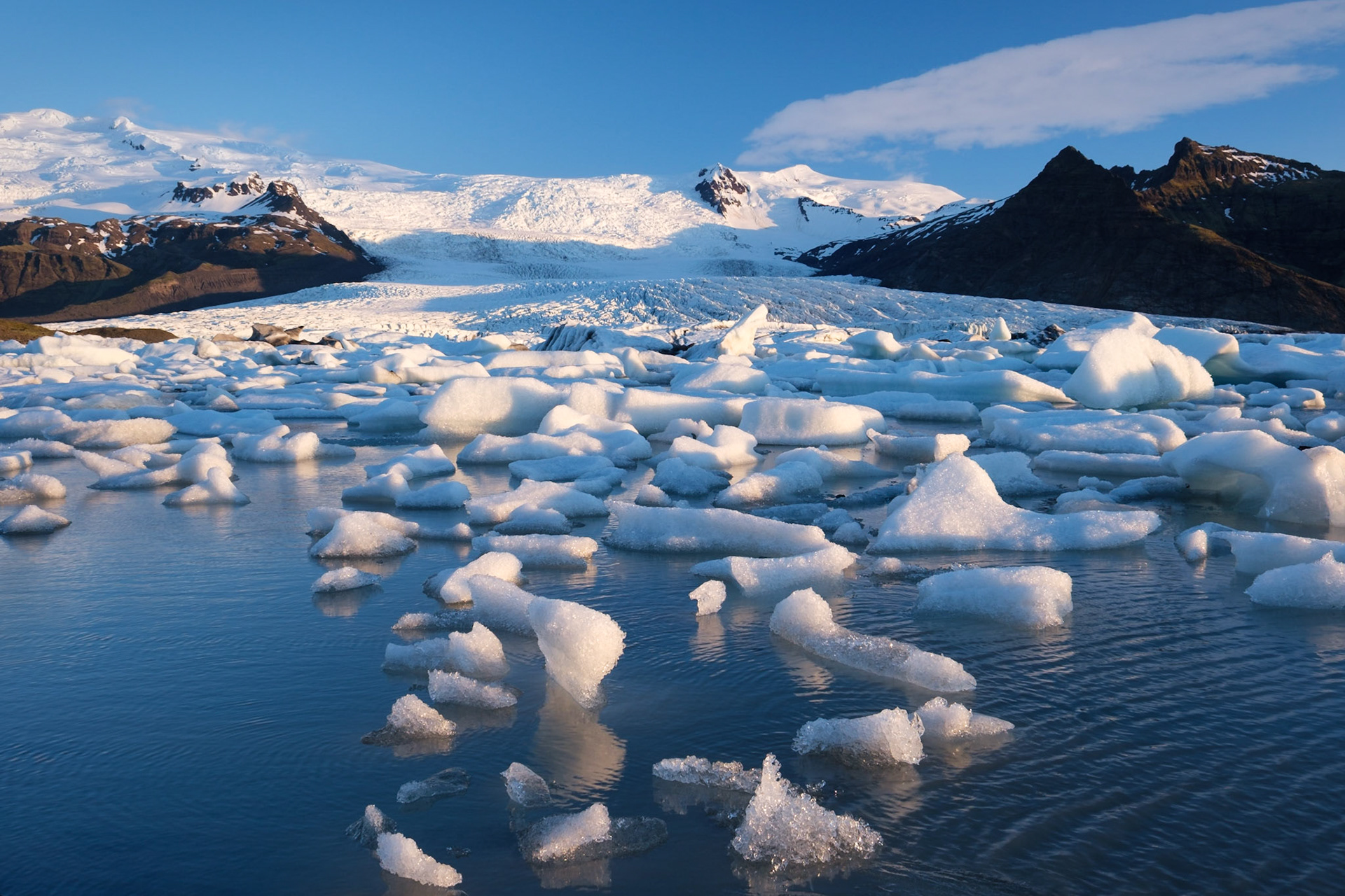An early morning (4am!) view  of the ice collecting at the outlet of Fjallsárlón lagoon with Fjallsjökull glacier as the backdrop.