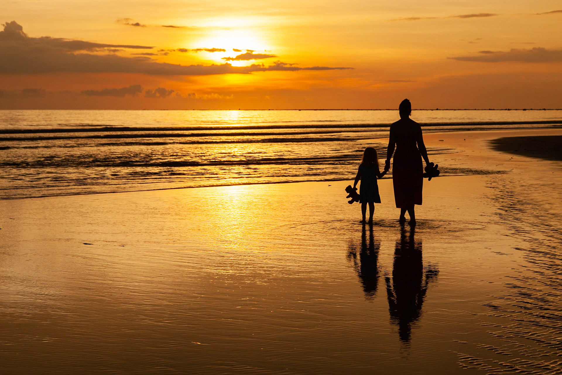 Sunset walk, Apsara Beach, Khao Lak, Thailand.