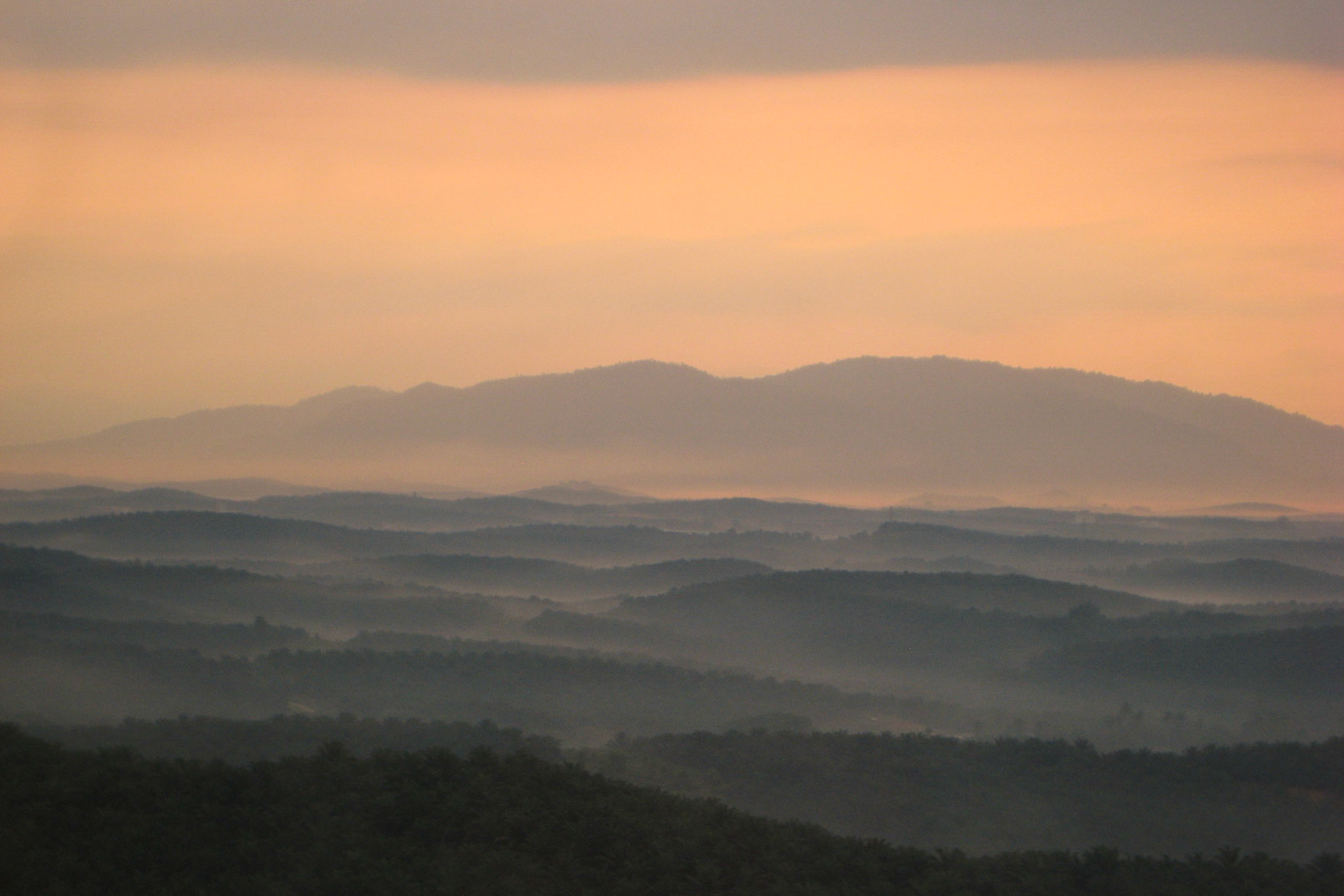Sunset on approach to Kuala Lumpur International Airport, Malaysia.