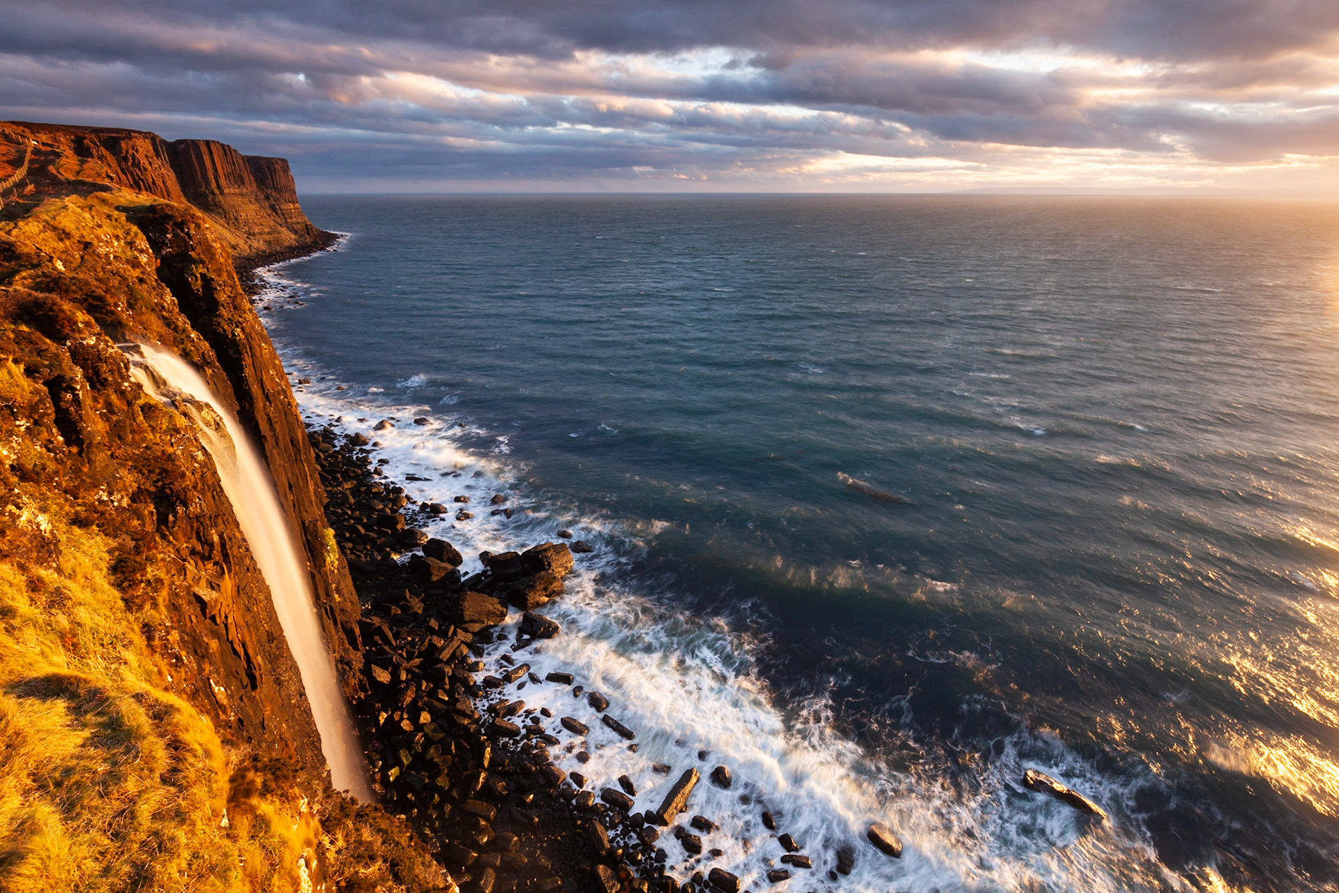 Sunrise at Mealt Falls with Kilt Rock in the background, Isle of Skye