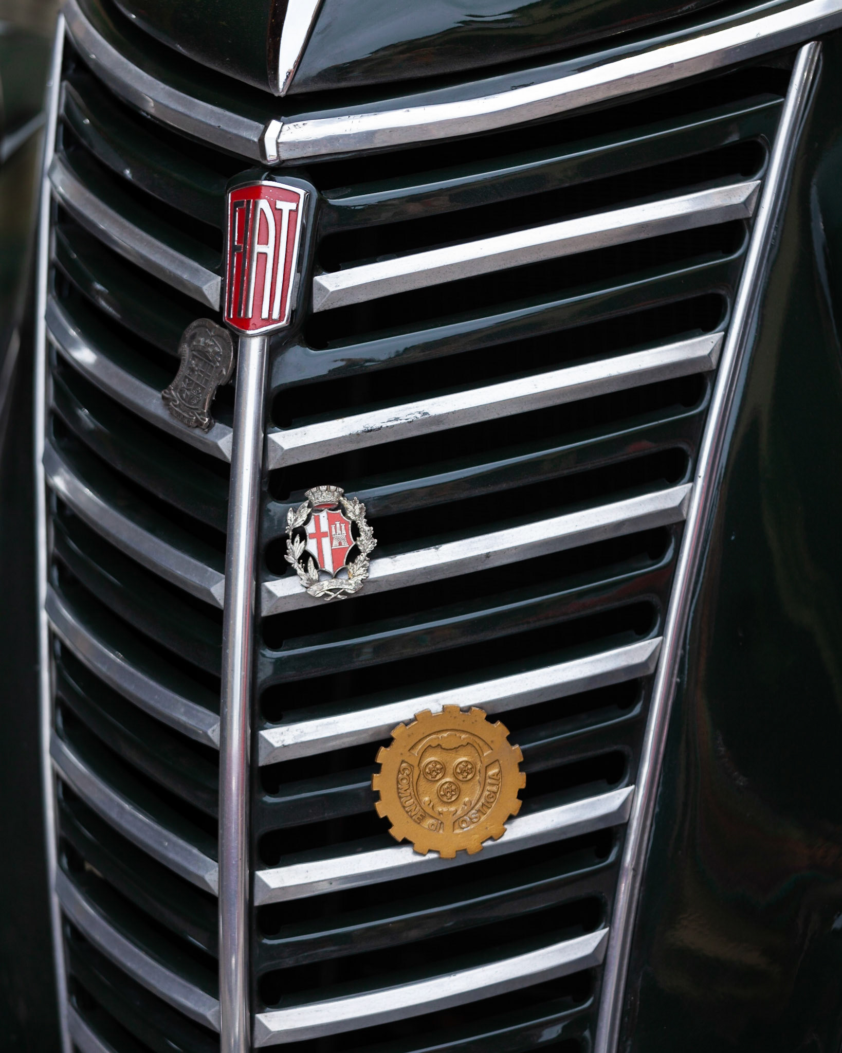 Another fine example of a Fiat in  the classic car rally which stopped at Greve in Chianti, Tuscany, Italy.