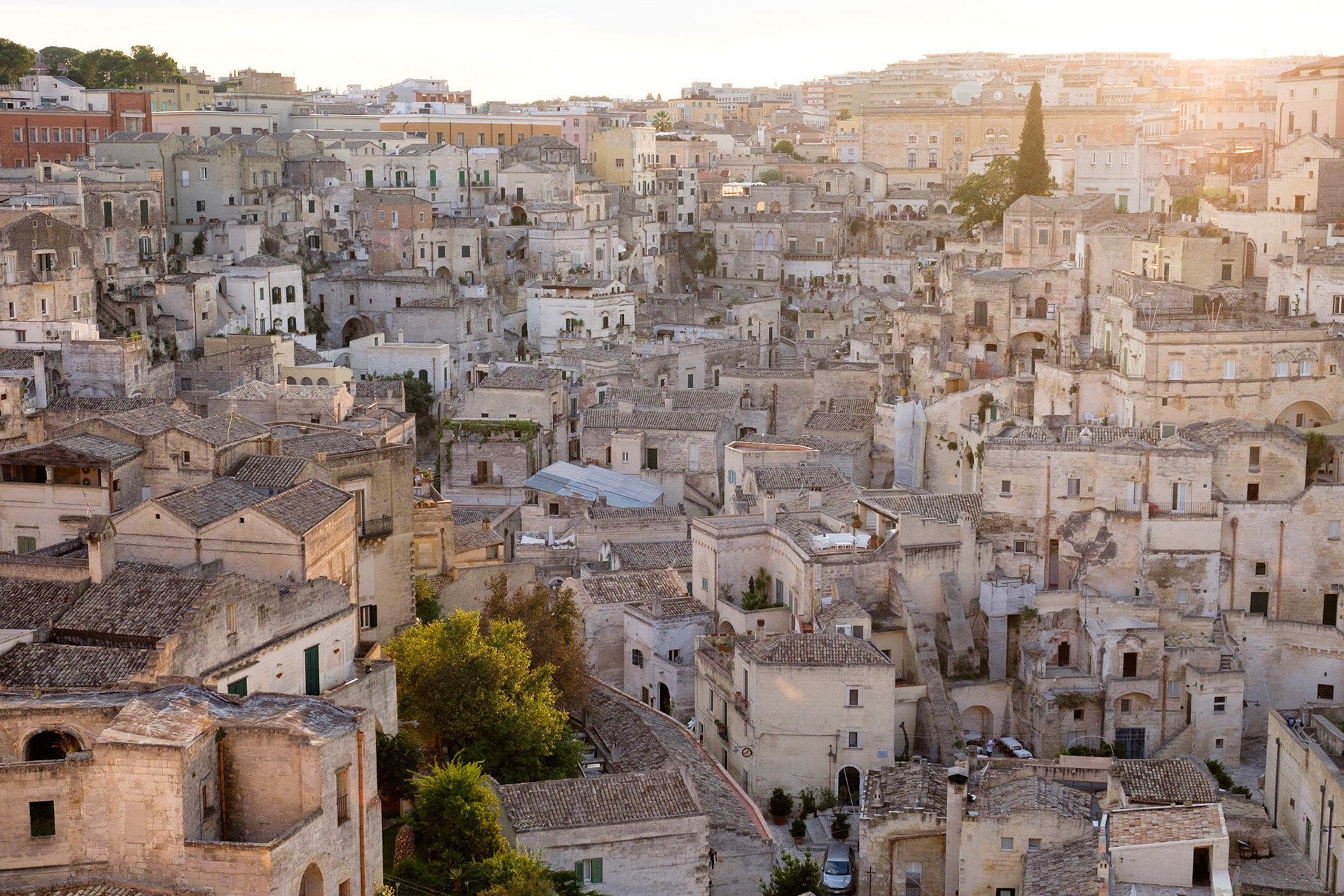 An evening view of Matera's Sasso Barisano area from outside the Matera Cathedral.
