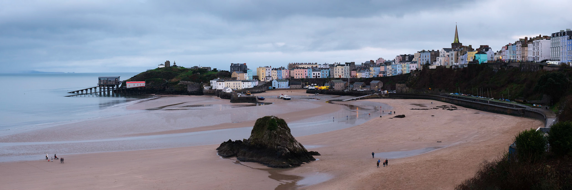 Blue hour at Tenby harbour with a very low tide, Wales.