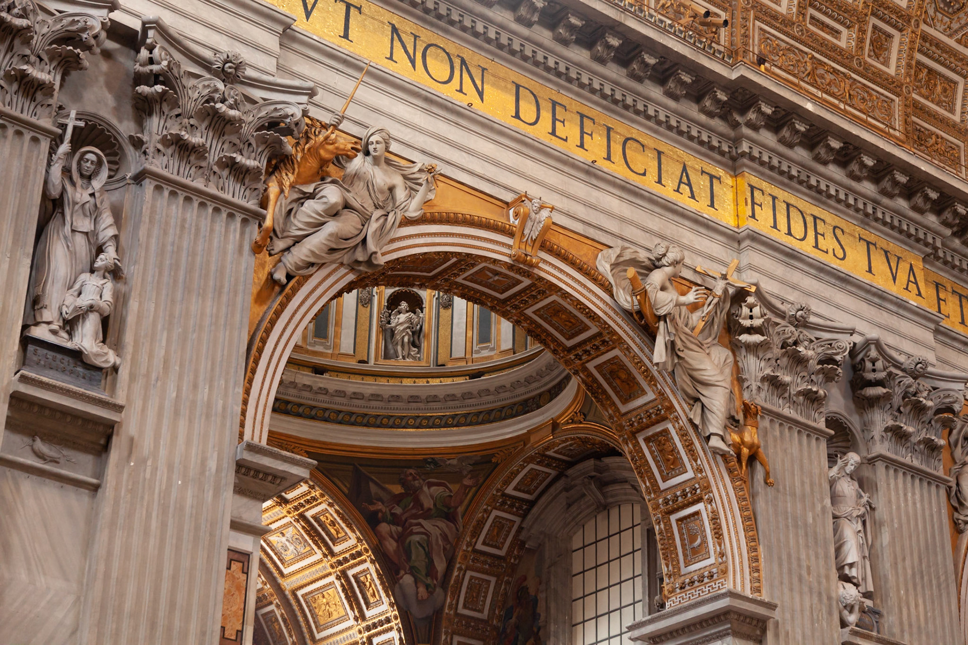 Scultpure and gold create an awe inspiring sight inside St Peter's Basilica, Vatican City, Italy.