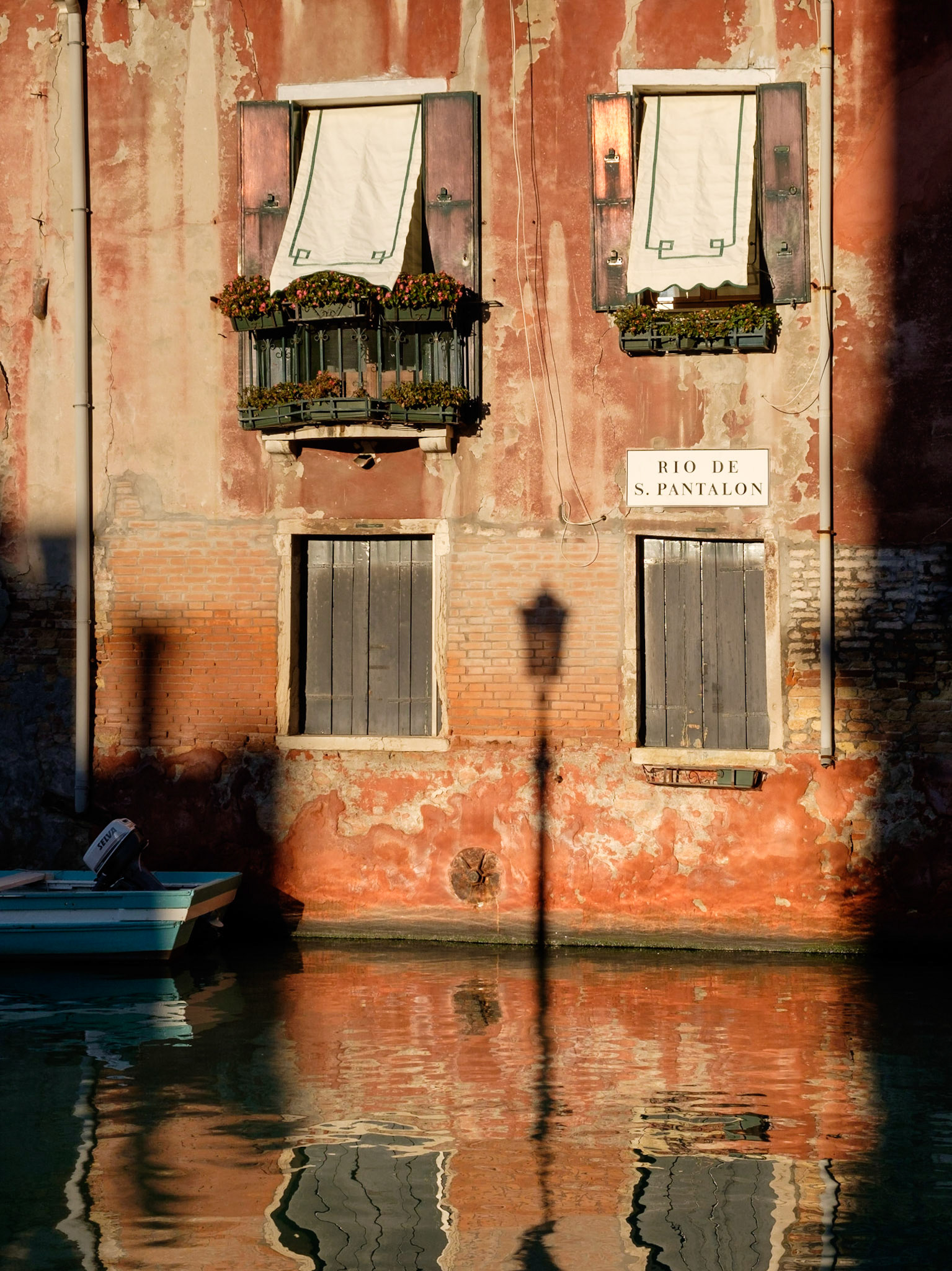 Early morning light and reflections in Dorsoduro, Venice.