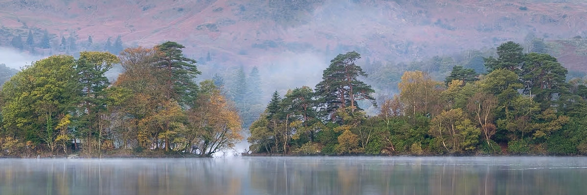 The Rydal Water islands on a misty morning.