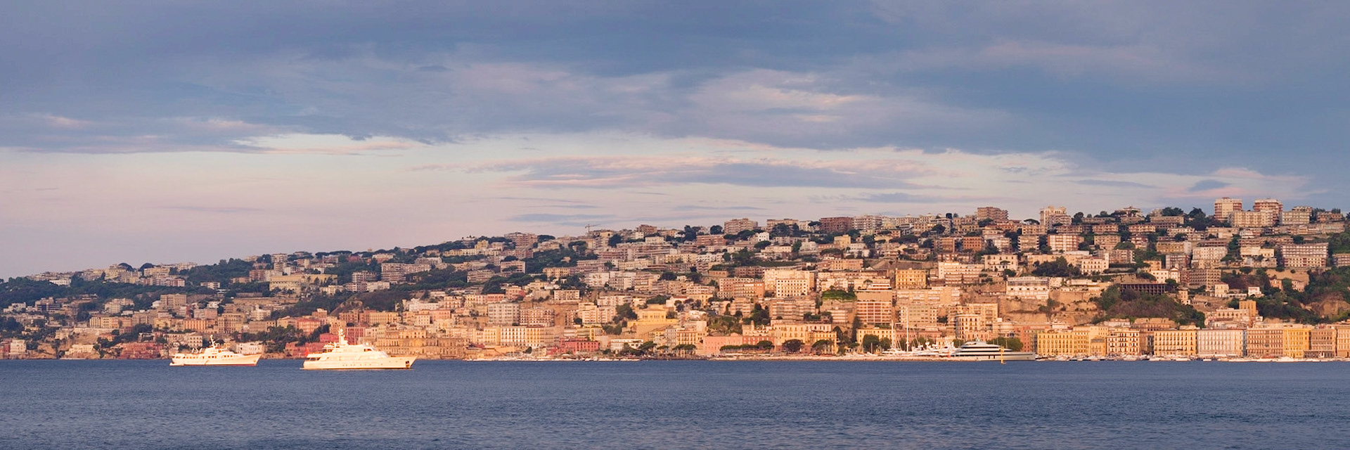 A pair of superyachts moored off the coast of Naples.