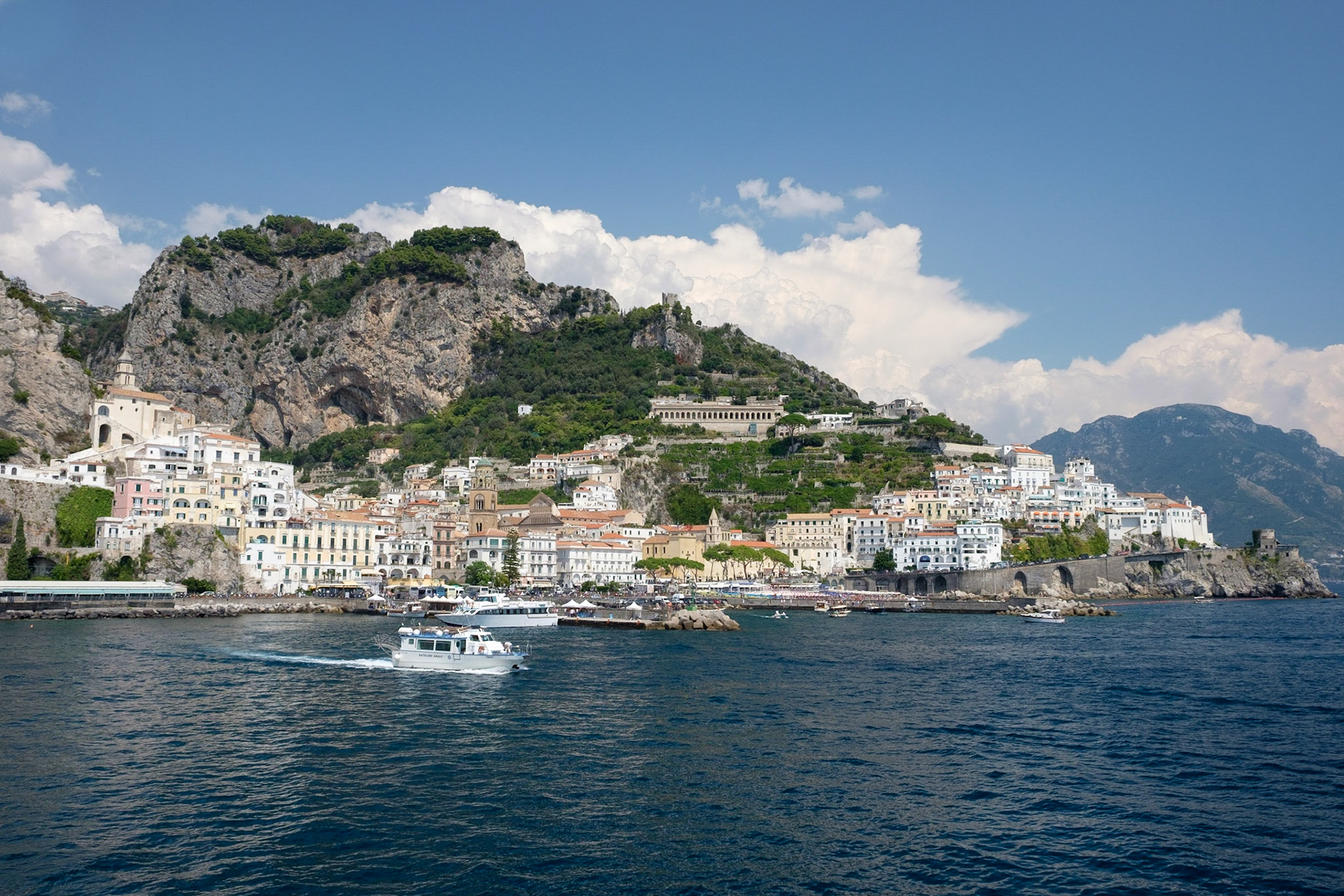 Amalfi as seen from the end of its harbour wall.