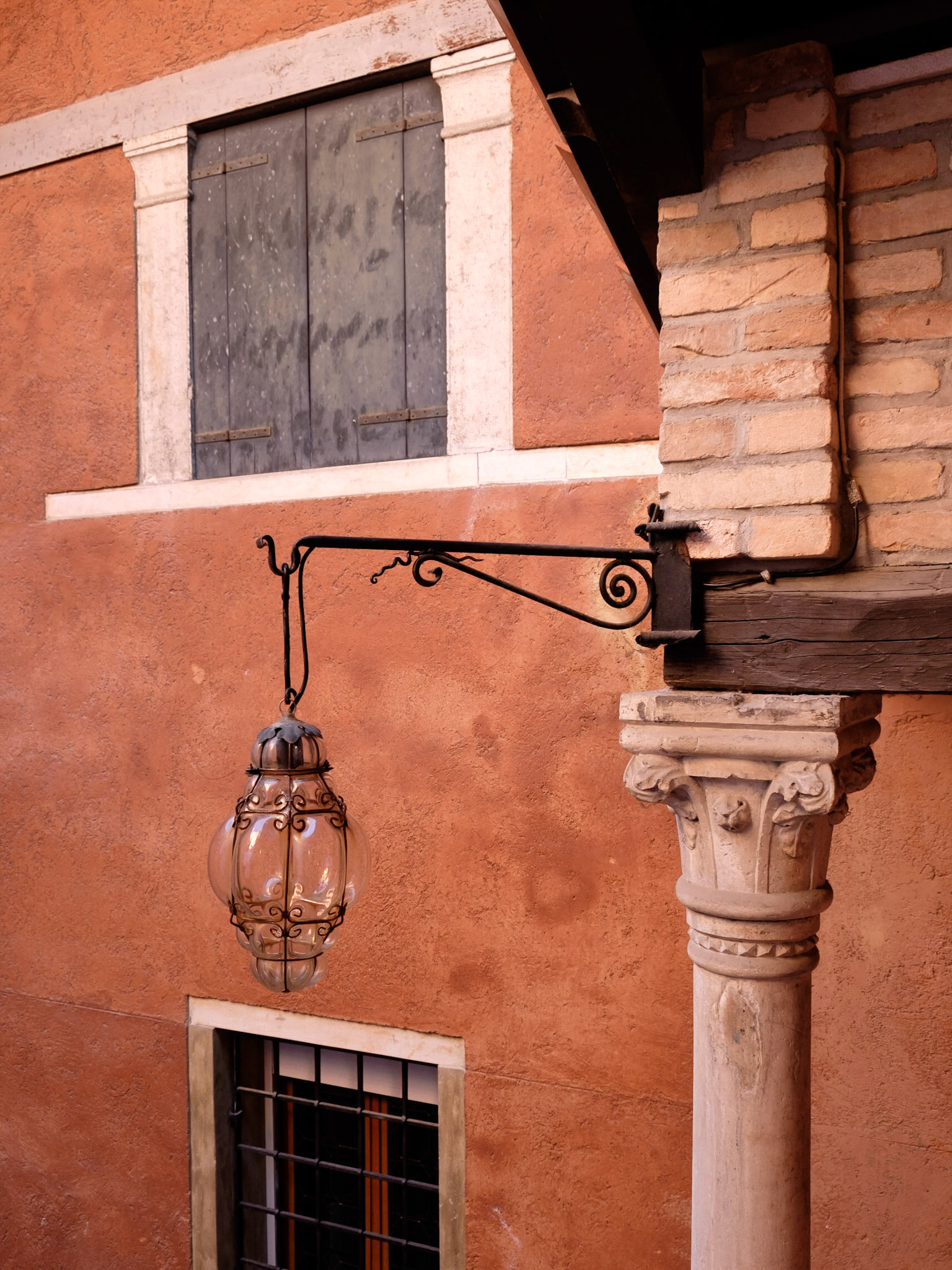The lamp lighting the stairs in the courtyard of Casa Veronica, Santa Croce, Venice.