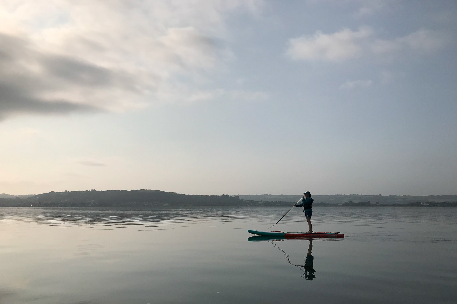 Paddle boarding on the River Loughor in the early morning.