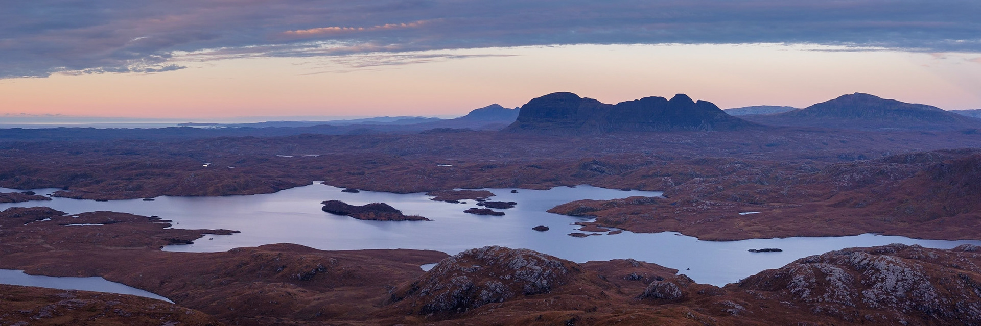 The view from Stac Pollaidh looking across Loch Sionasgaig towards Suilven.