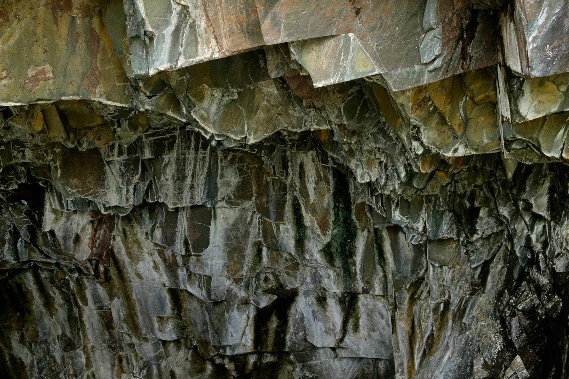 Slate walls of Millican Dalton's Cave, The Lake District, England.