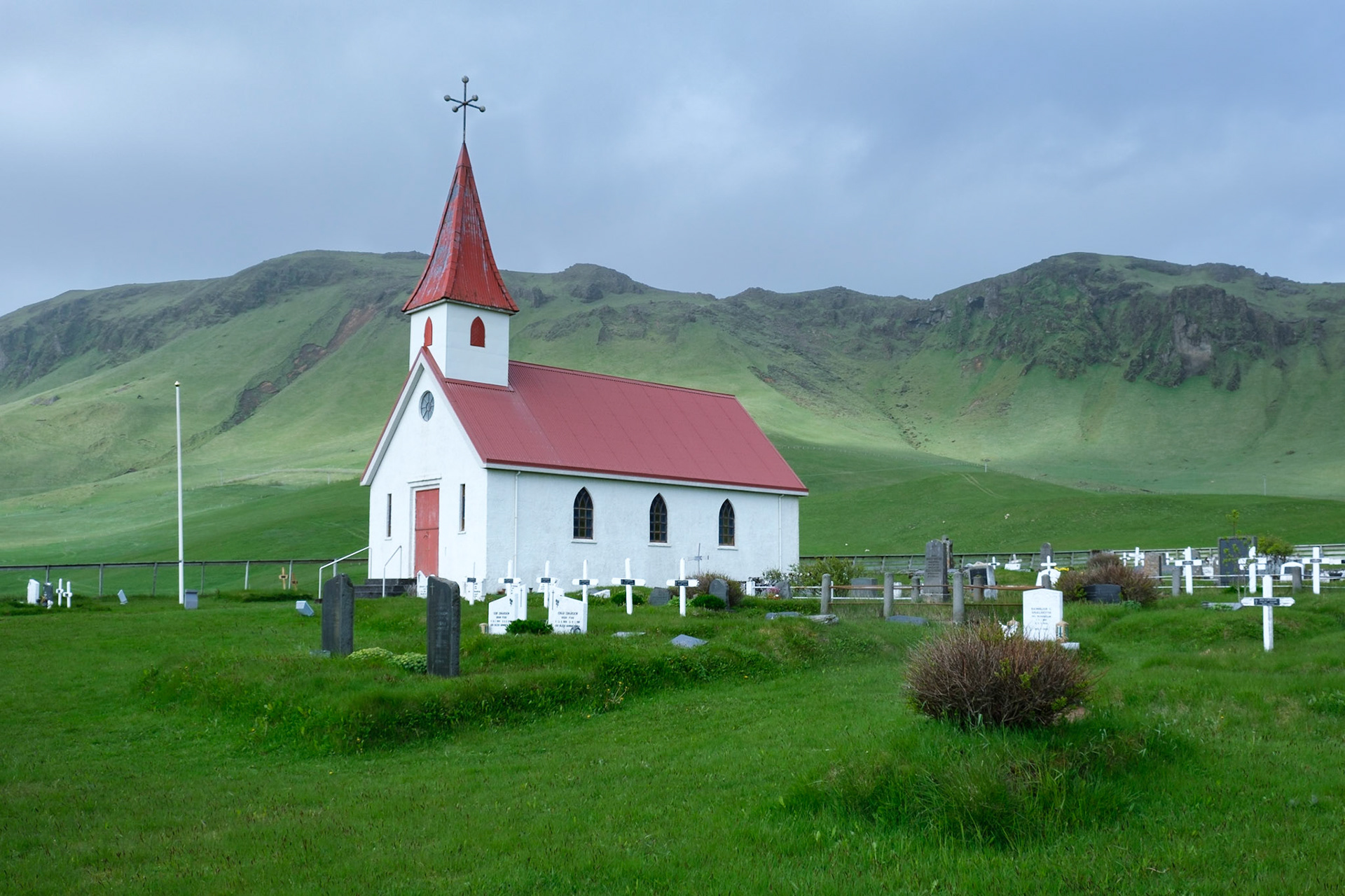 Reyniskirkja, a Lutheran Church in the typical Iceland style near Reynisfjara Beach.