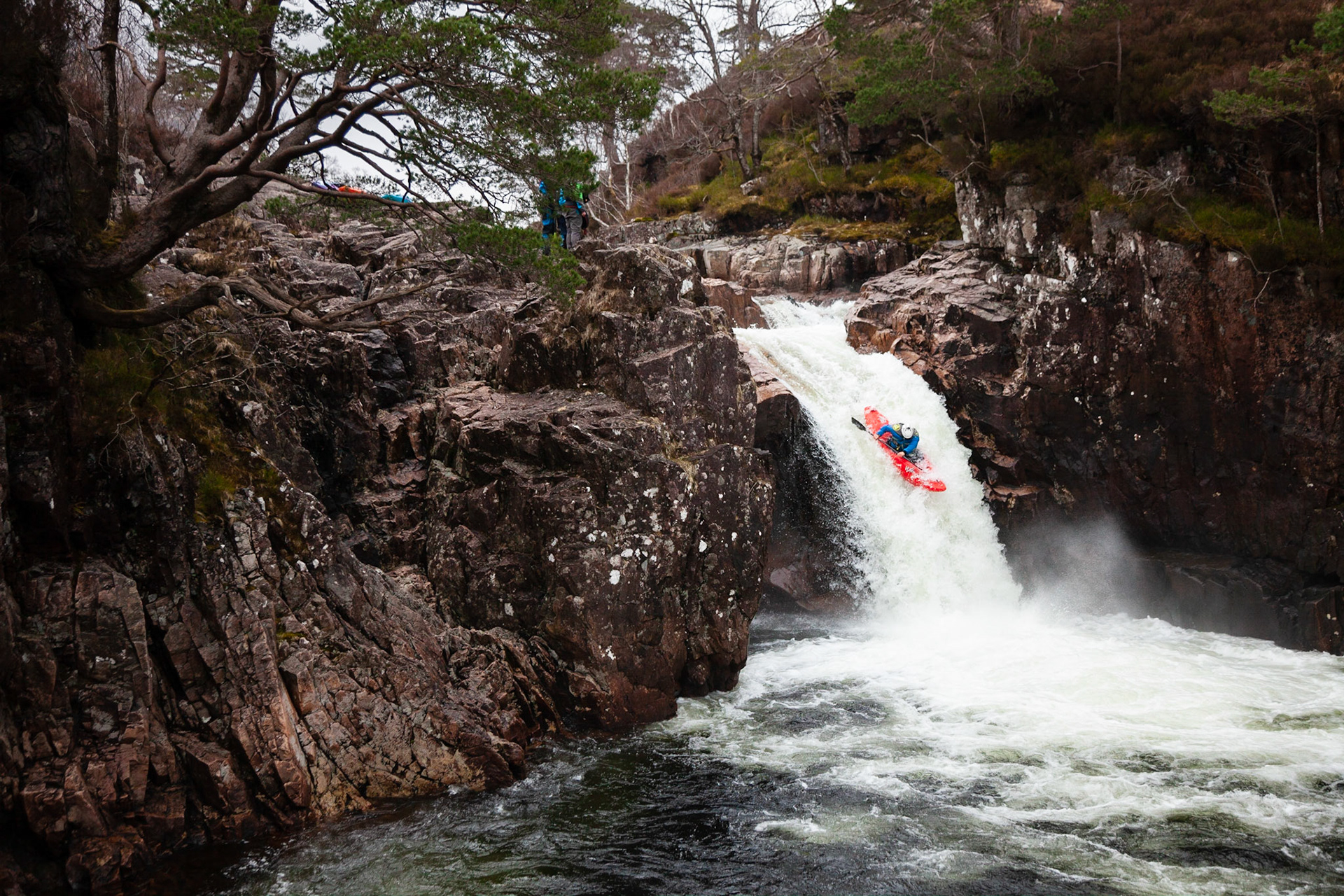 Kayaker running Right Angle Falls on the River Etive.