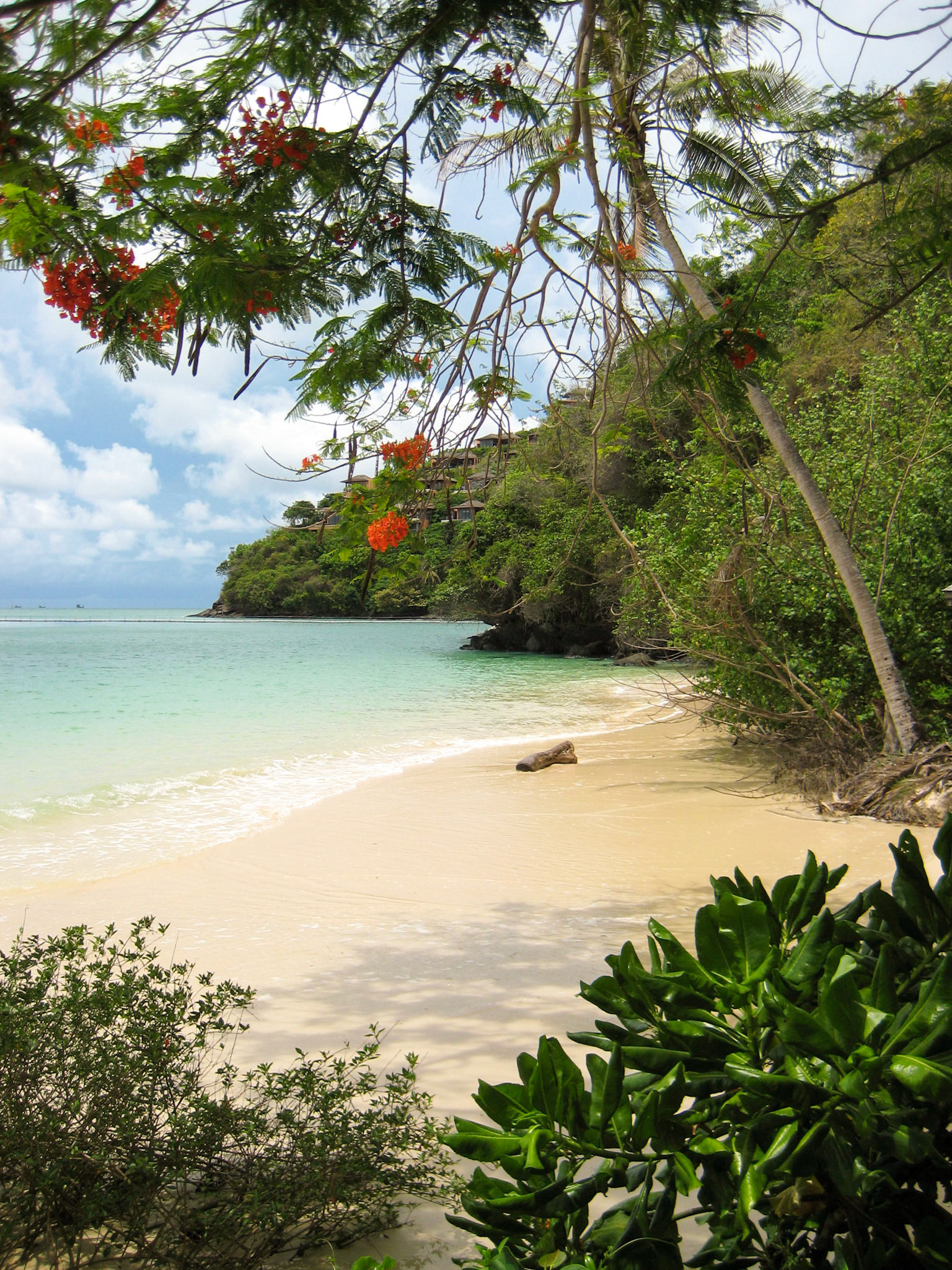 High tide at the beach, Hotel Cape Panwa, Phuket, Thailand.