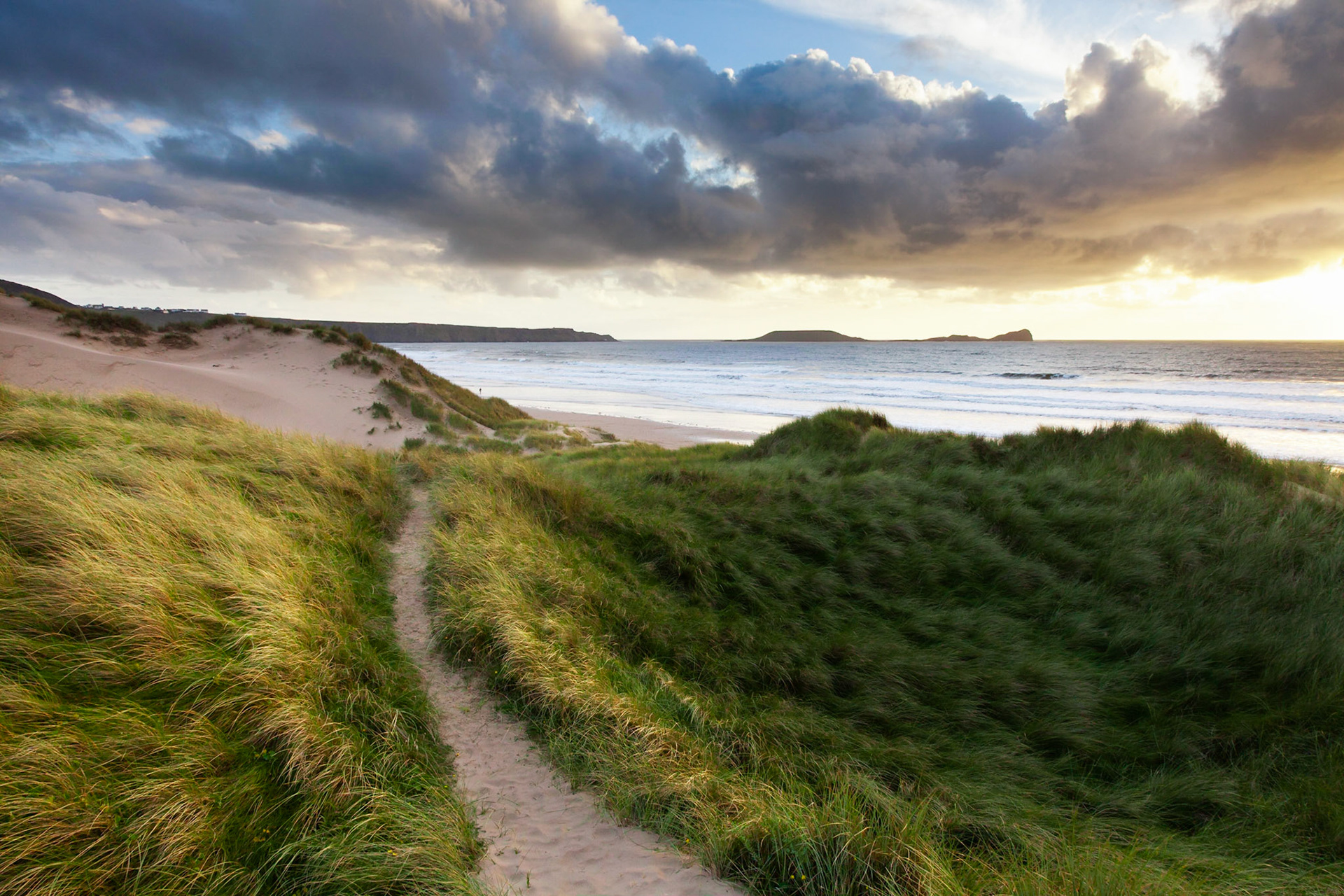 Sunset from the dunes, Gower Peninsula, Wales, United Kingdom.