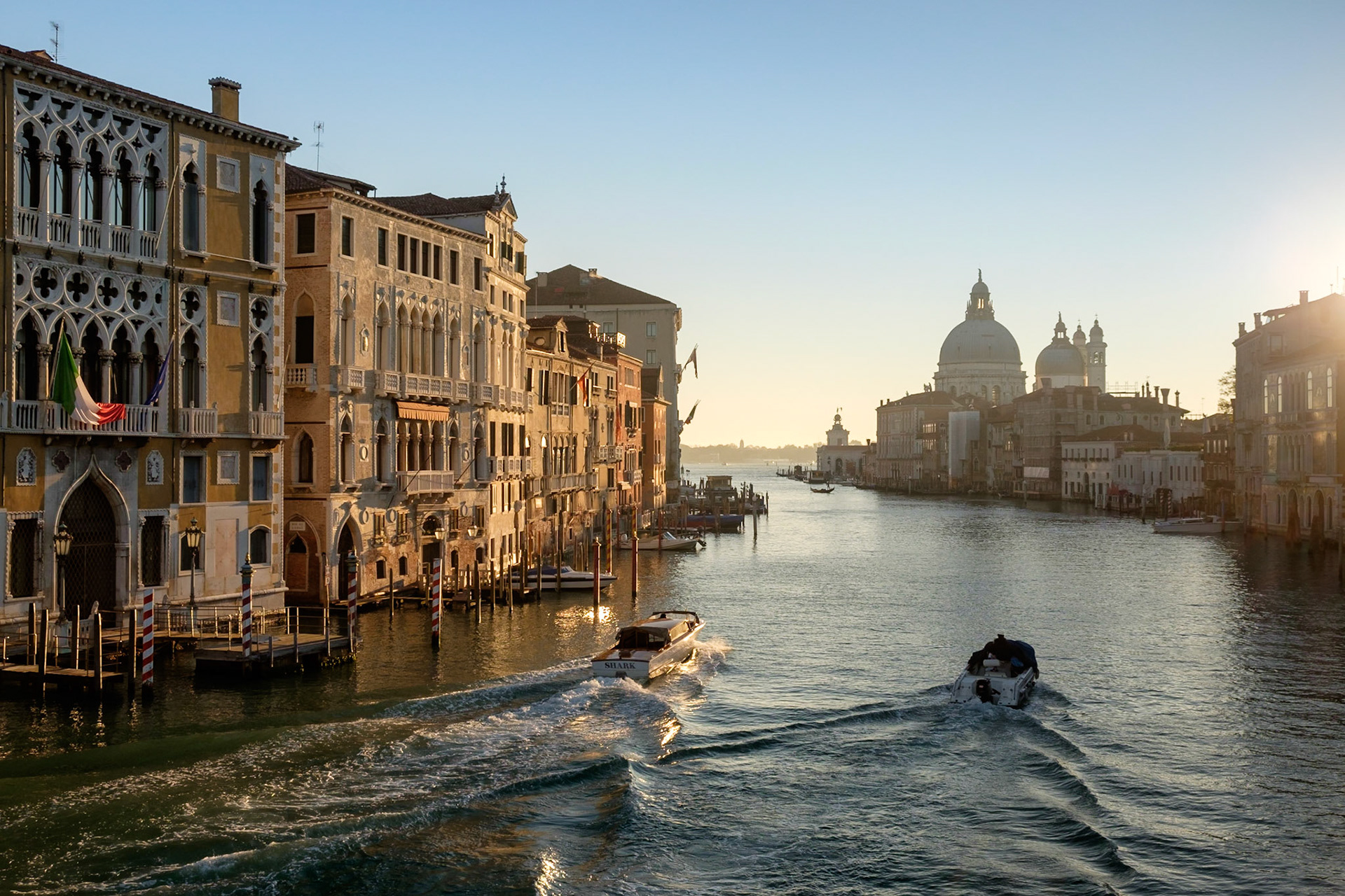 Early morning looking down the Grand Canal from Ponte dell'Accademia towards the Basilica di Santa Maria della Salute, Dorsoduro, Venice.