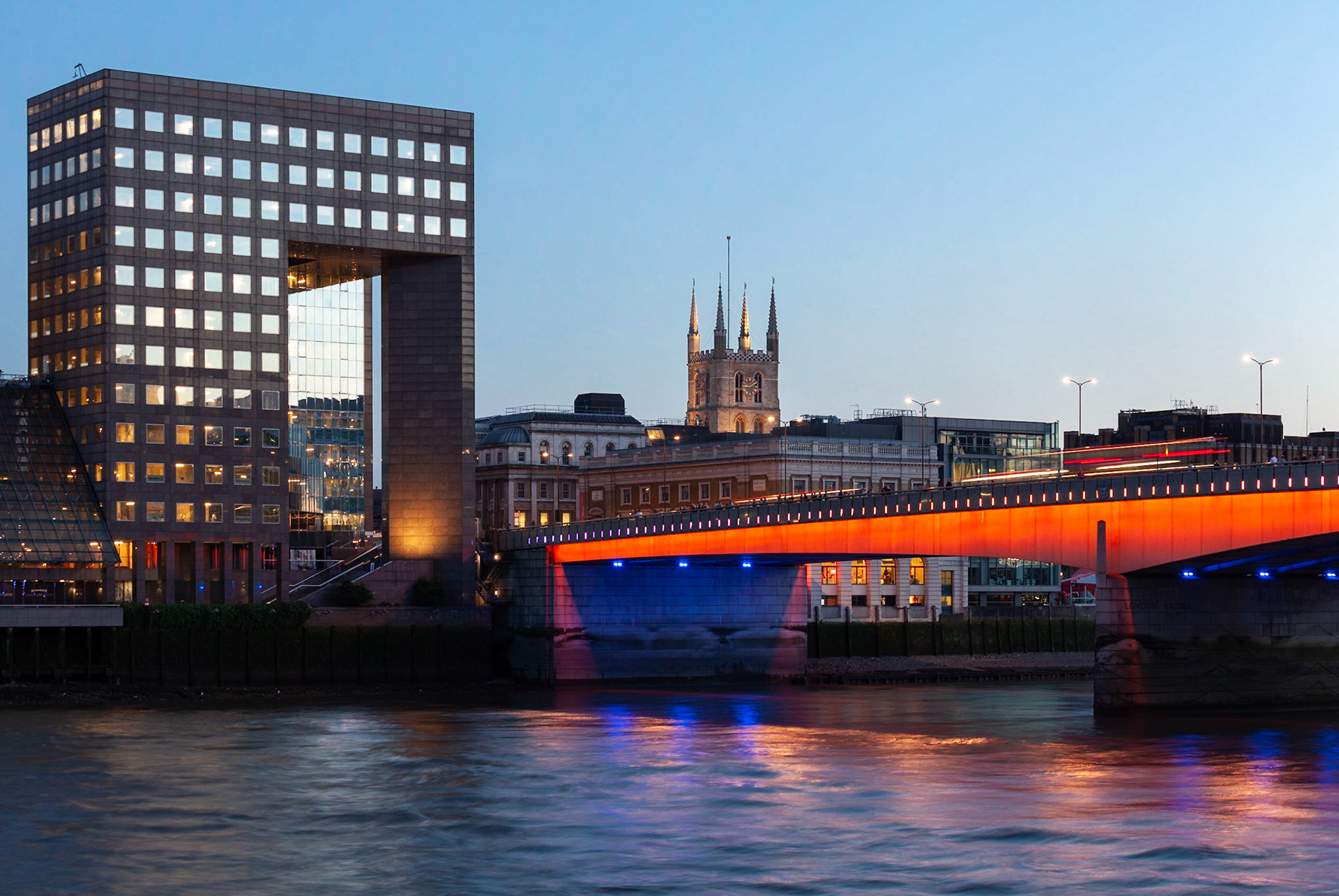London Bridge lit up in London 2012 colours, London, England.