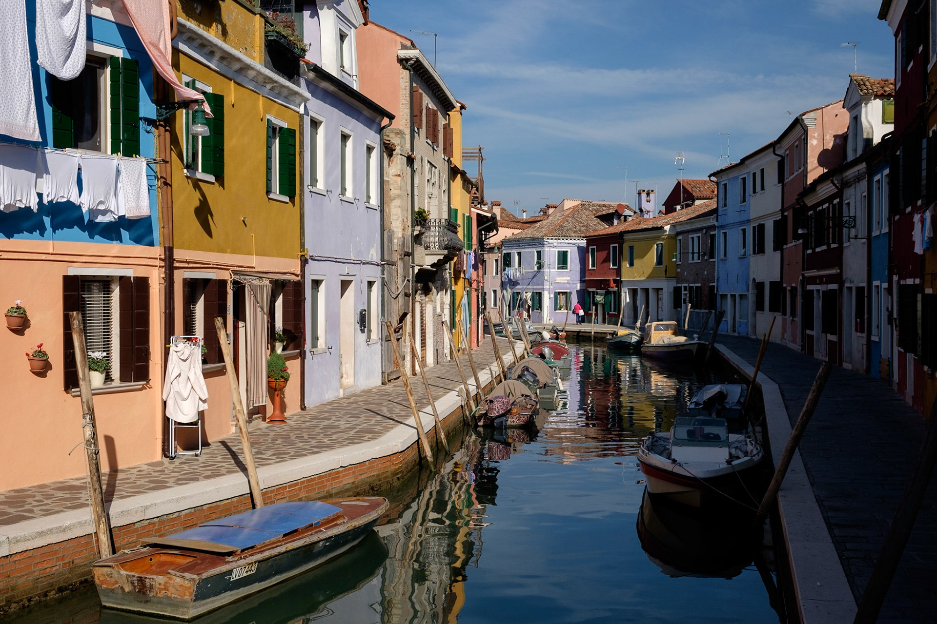Colourful houses line the canals on Burano, Venice.