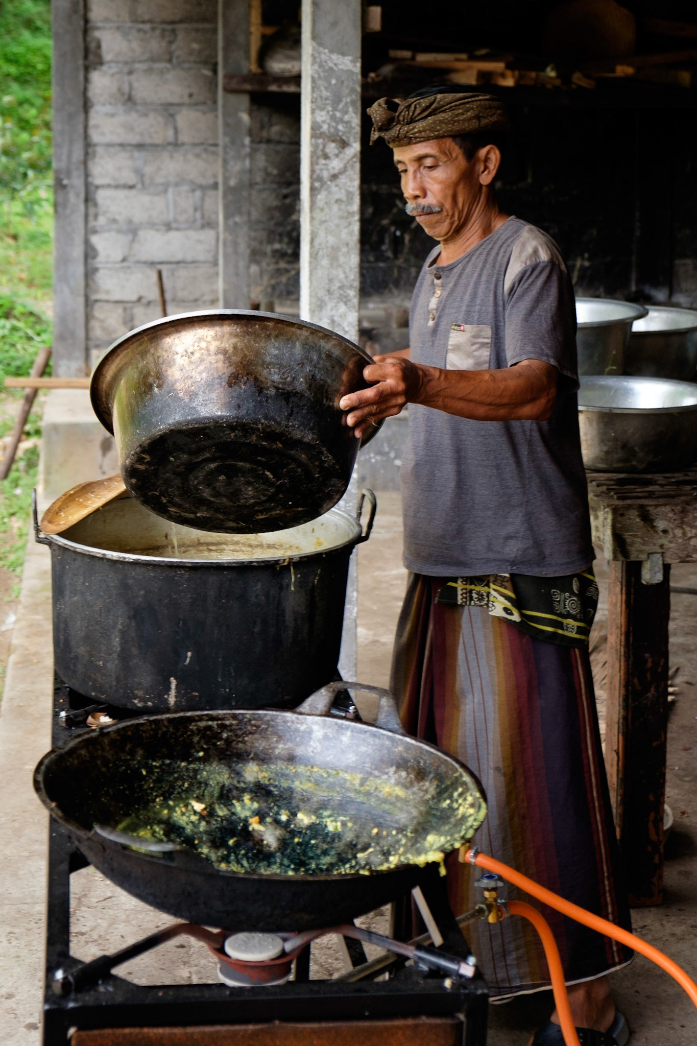 Preparing the food for tomorrow's knowledge day celebrations at Gunung Kawi Temple, Ubud, Bali, Indonesia.
