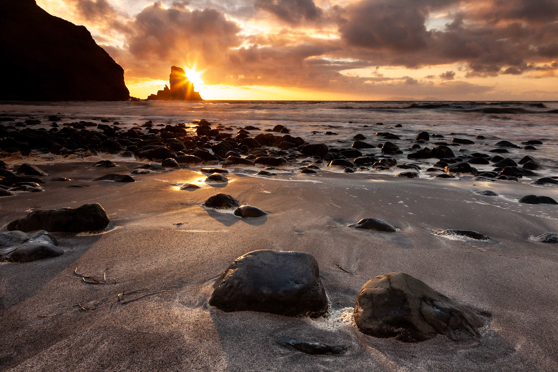 Sunset over Talisker Beach, Isle of Skye, Scotland.