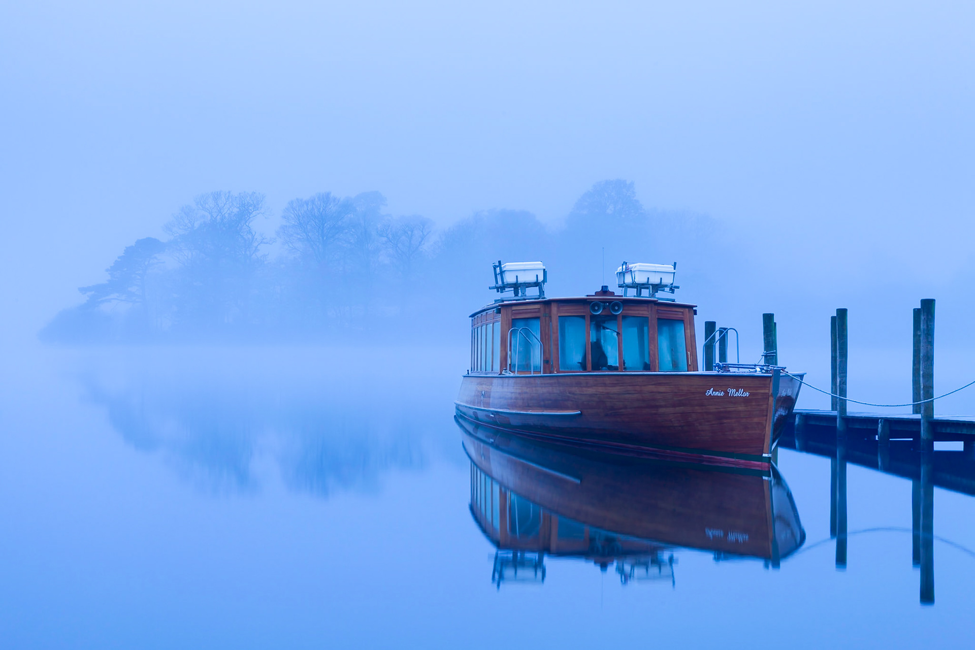 The Annie Mellor moored on Derwent Water on a misty morning, The Lake District, England.