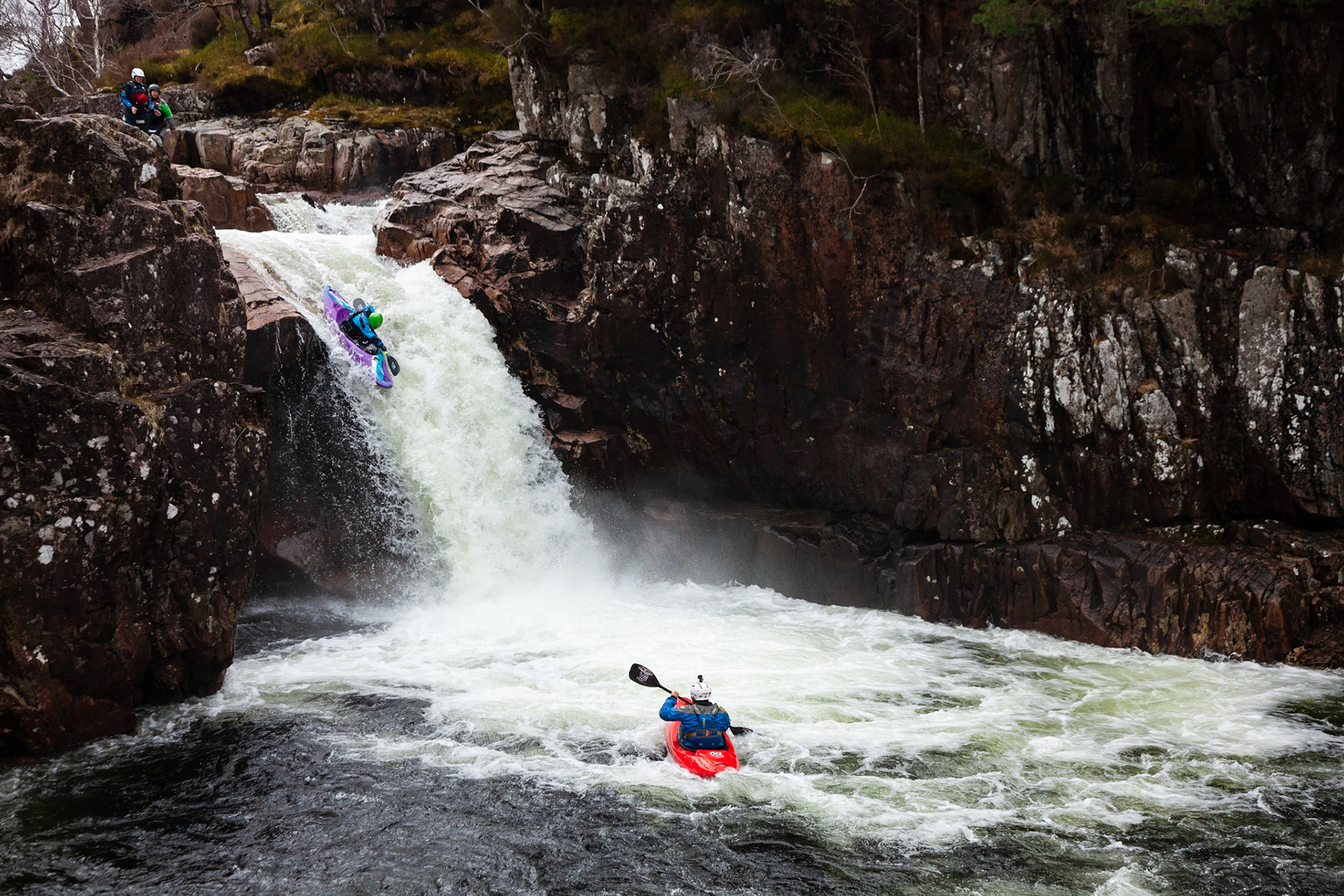 Kayaker running Right Angle Falls on the River Etive.