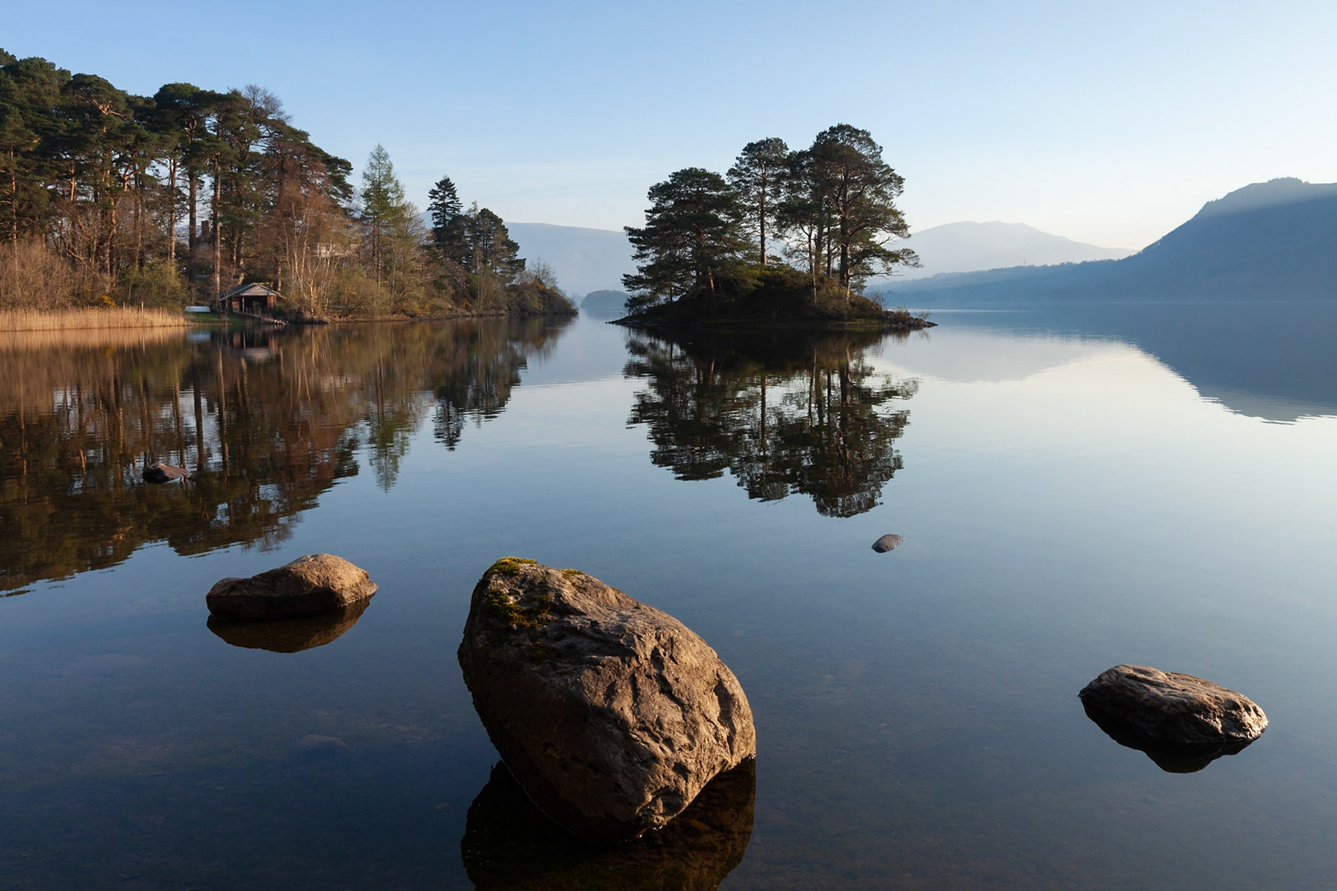 Abbot's Bay and Otter Island on Derwent Water at sunrise, The Lake District, England.