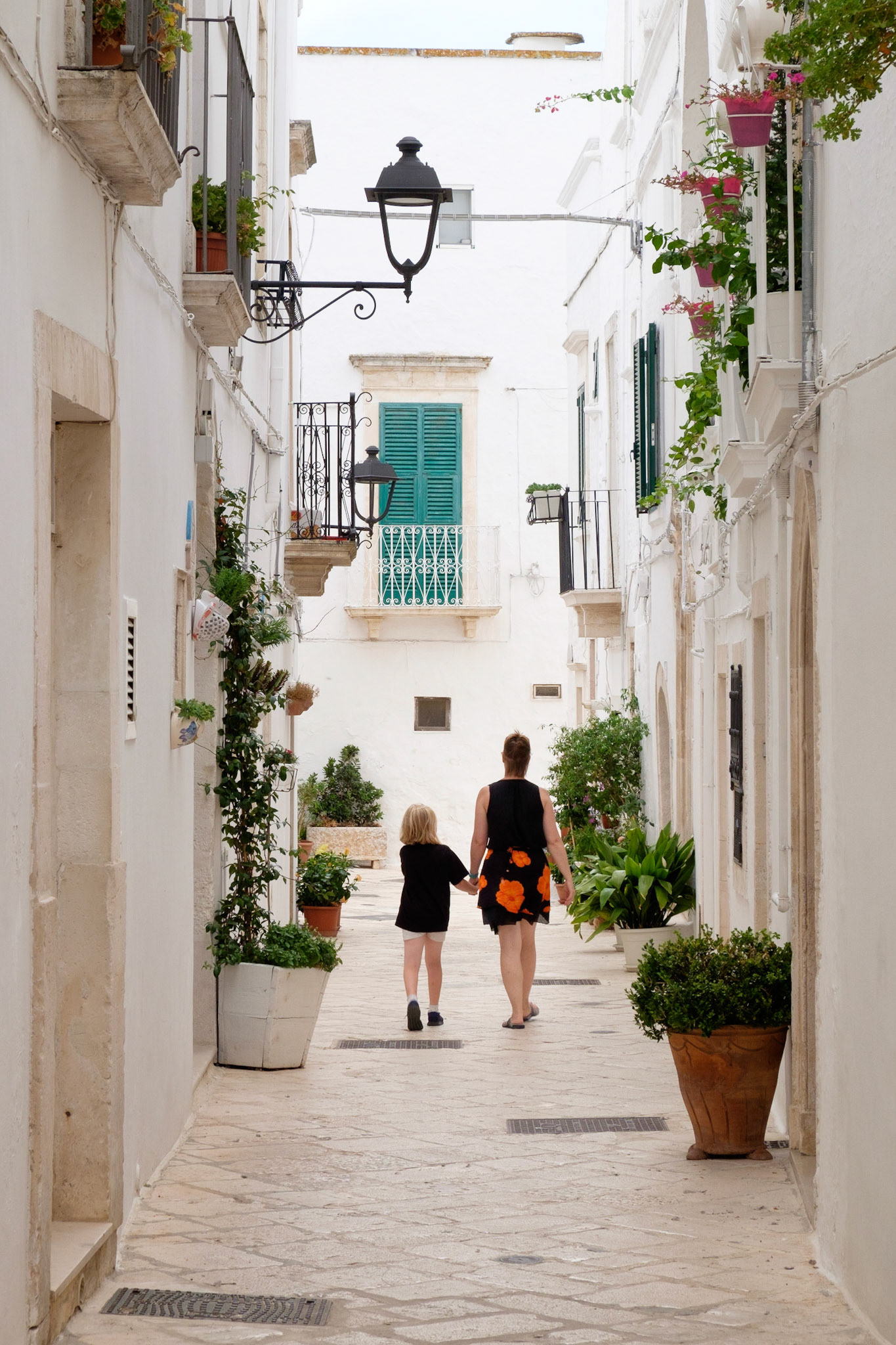 Exploring the narrow streets of Locorotondo.